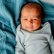 Janghveer joined the competition — help win amazing prizes! baby, blanket, blue_blanket, child, clothing, cozy, cute, eyes, face, head, indoor, infant, lying_down, newborn, person, portrait, skin, sleepy, soft_texture, white_onesie
