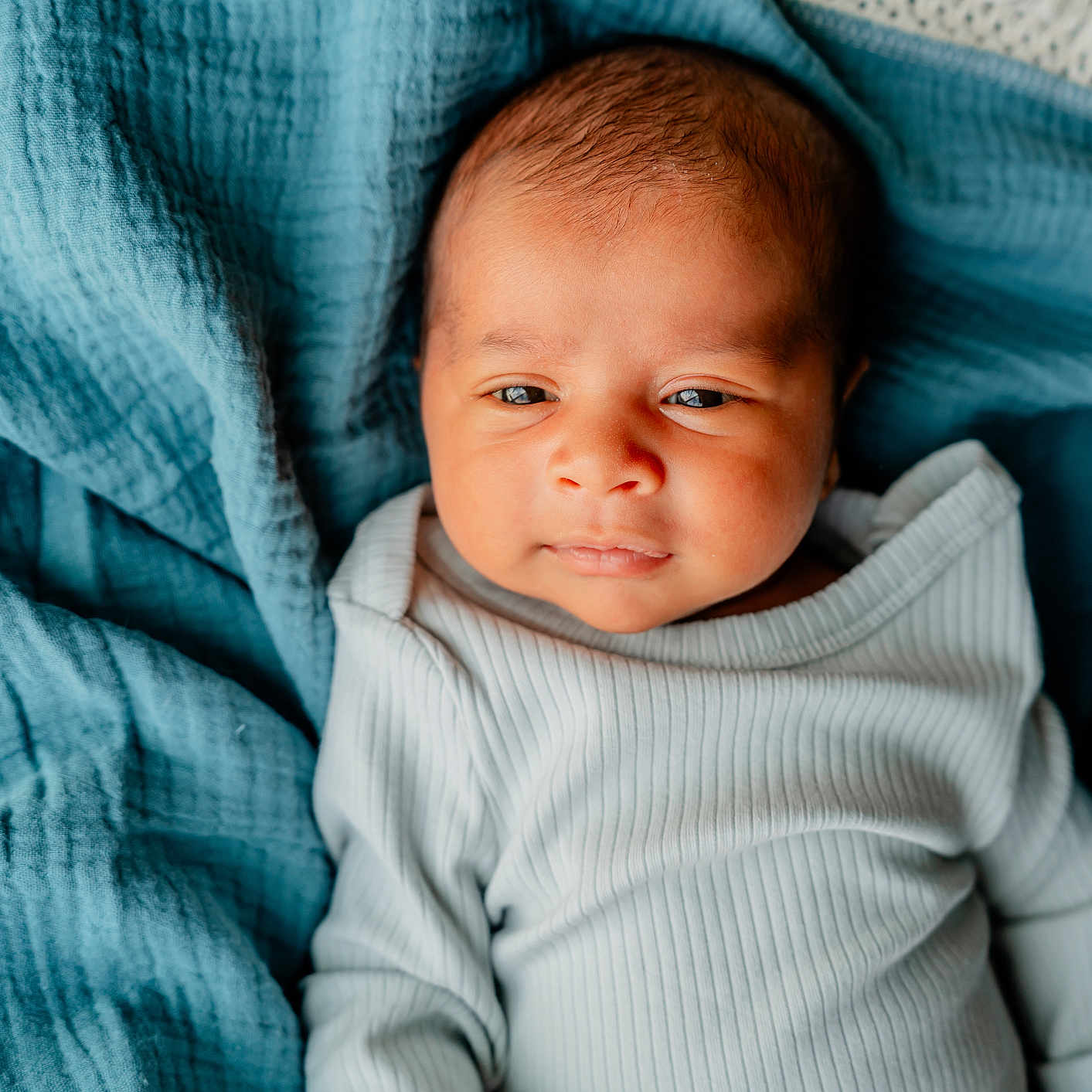 Janghveer joined the competition — help win amazing prizes! baby, blanket, blue_blanket, child, clothing, cozy, cute, eyes, face, head, indoor, infant, lying_down, newborn, person, portrait, skin, sleepy, soft_texture, white_onesie