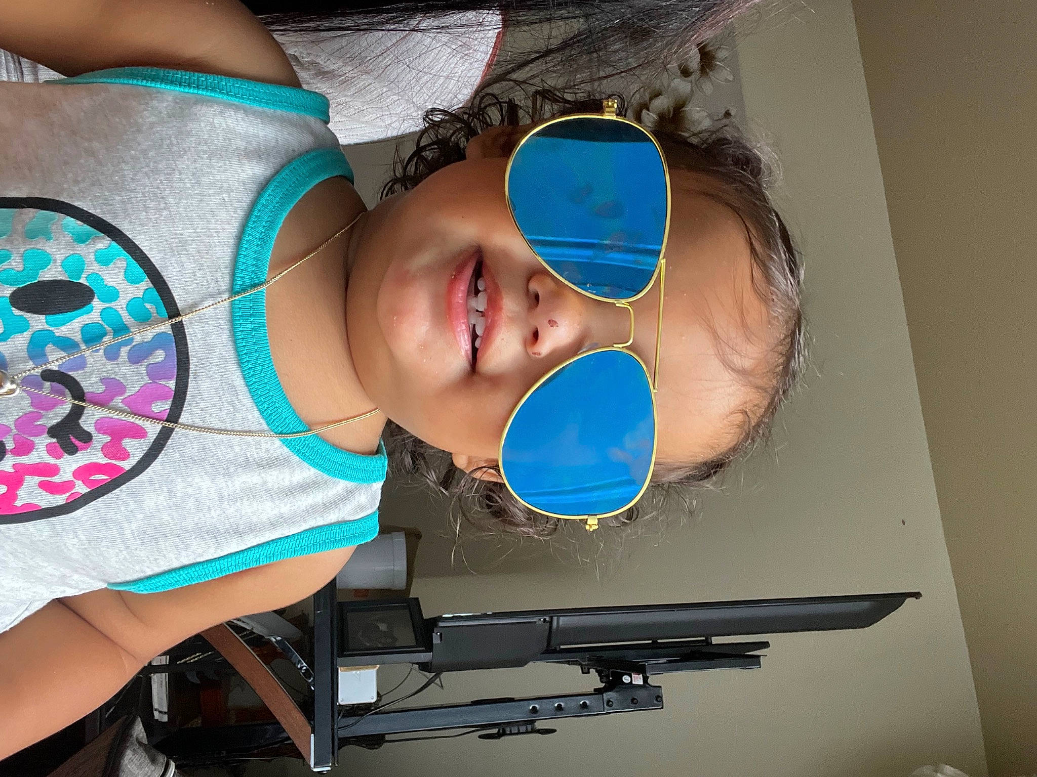 Guviannie Leeanet is registered to the contest to win money with this photo: baby, child, clothing, cool, electric_blue, eyelash, eyewear, face, fashion_accessory, fun, hat, headgear, helmet, jewellery, mouth, person, personal_protective_equipment, service, smile, sports_gear