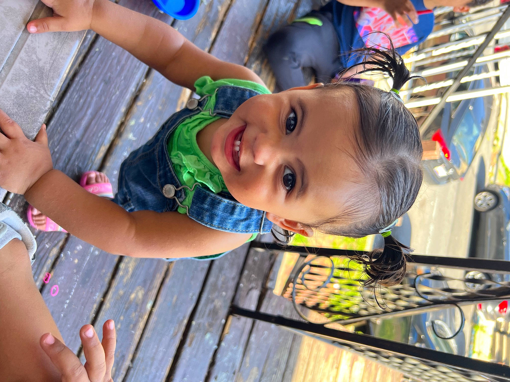 Guviannie Leeanet is registered to the contest to win money with this photo: baby, blue, child, facial_expression, finger, fun, grass, hand, happy, joy, leaf, leisure, person, play, public_space, recreation, smile, thumb, toddler, vacation