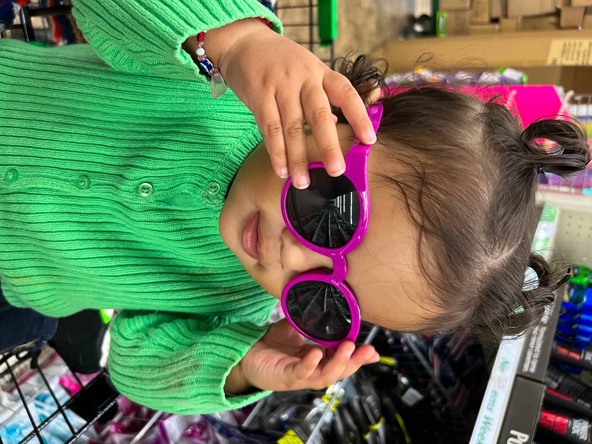 Guviannie Leeanet joined the competition — help win amazing prizes! audio_equipment, black_hair, cool, ear, eyelash, eyewear, finger, fun, green, happy, hearing, magenta, nail, person, personal_protective_equipment, pink, purple, red, snapshot, toddler