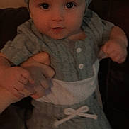 Mason joined the competition — help win amazing prizes! baby, infant, child, portrait, indoor, seated, gray_outfit, knit_cap, onesie, couch, adult_hand, support, wide_eyed, looking_at_camera, cute, cozy, home, soft_lighting, closeup, family
