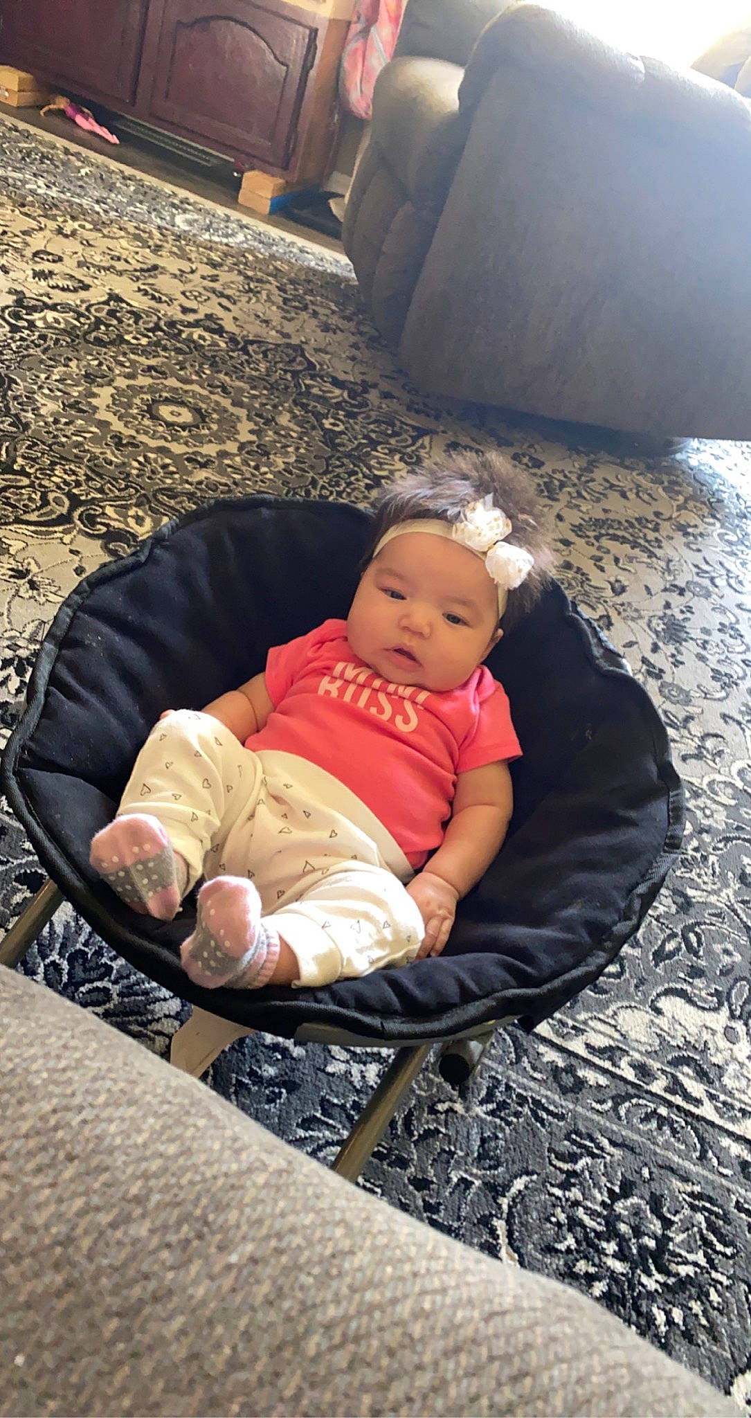 Aviana joined the competition — help win amazing prizes! baby, baby_carriage, baby_products, ball, child, comfort, fun, grass, head, headwear, lap, leg, leisure, person, recreation, rock, sitting, toddler, tree, vacation