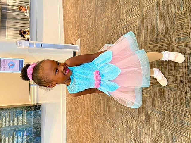 Jakai is registered to the contest to win money with this photo: azure, baby, baby_products, baby_toddler_clothing, ballet_tutu, child, electric_blue, flooring, fun, happy, joy, leisure, magenta, person, play, room, toddler, wood