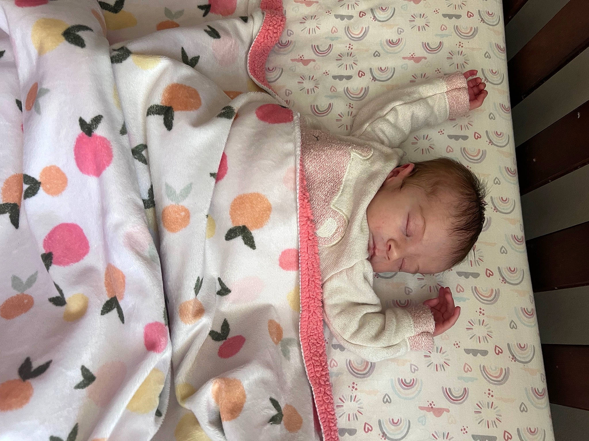 Zoey joined the competition — help win amazing prizes! baby, baby_products, baby_toddler_clothing, bedding, bedtime, child, collar, comfort, infant_bed, linens, pattern, peach, person, petal, pink, room, sleep, sleeve, textile, toddler