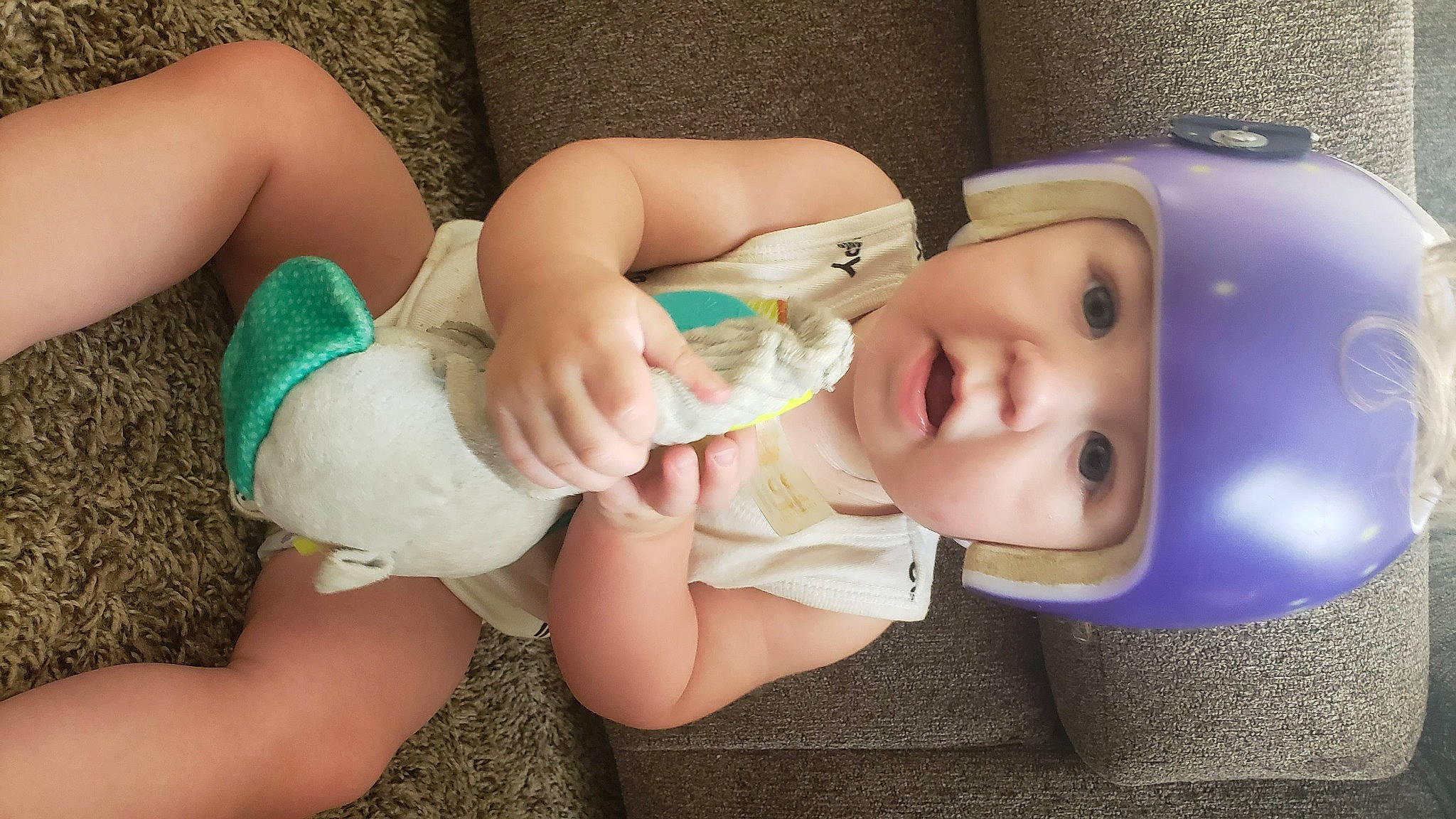 Dixon is registered to the contest to win money with this photo: baby, baby_products, child, diaper, hand, headwear, leg, person, product, skin, toddler