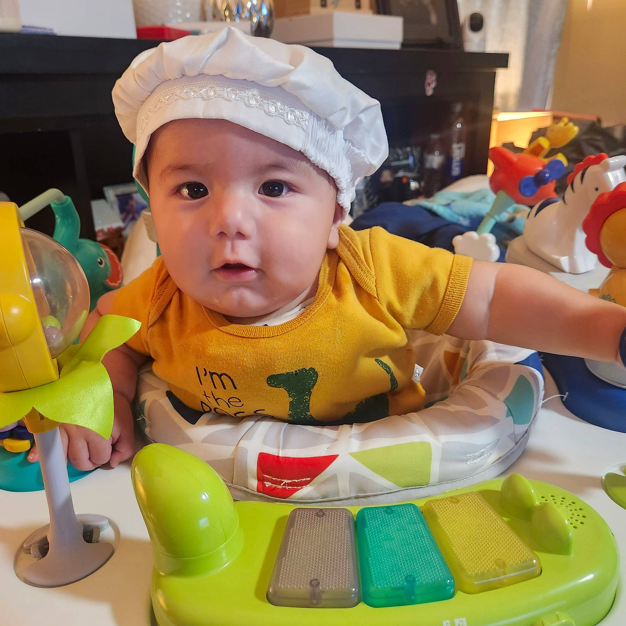 Leo joined the competition — help win amazing prizes! baby, baby_playing_with_toys, baby_products, baby_toddler_clothing, baby_toys, cap, child, fictional_character, fun, happy, headwear, person, plastic, play, product, recreation, riding_toy, room, sitting, toddler