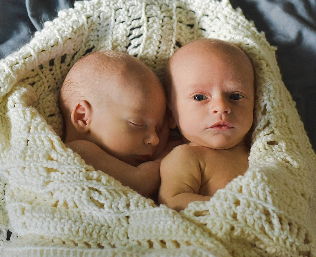 Bennett And Waylon is registered to the contest to win money with this photo: baby, baby_sleeping, baby_toddler_clothing, bedding, cheek, child, close_up, comfort, eye, facial_expression, fashion_accessory, fur, happy, headgear, iris, linens, person, skin, textile, toddler