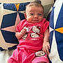 Lynahë participe au concours pour gagner de l'argent avec cette photo : baby, infant, child, hello_kitty, pink_clothing, smile, cushion, pillow, pattern, star_pattern, relaxed, indoors, cute, portrait, small_hands, shorts, tshirt, seated, happy, cozy