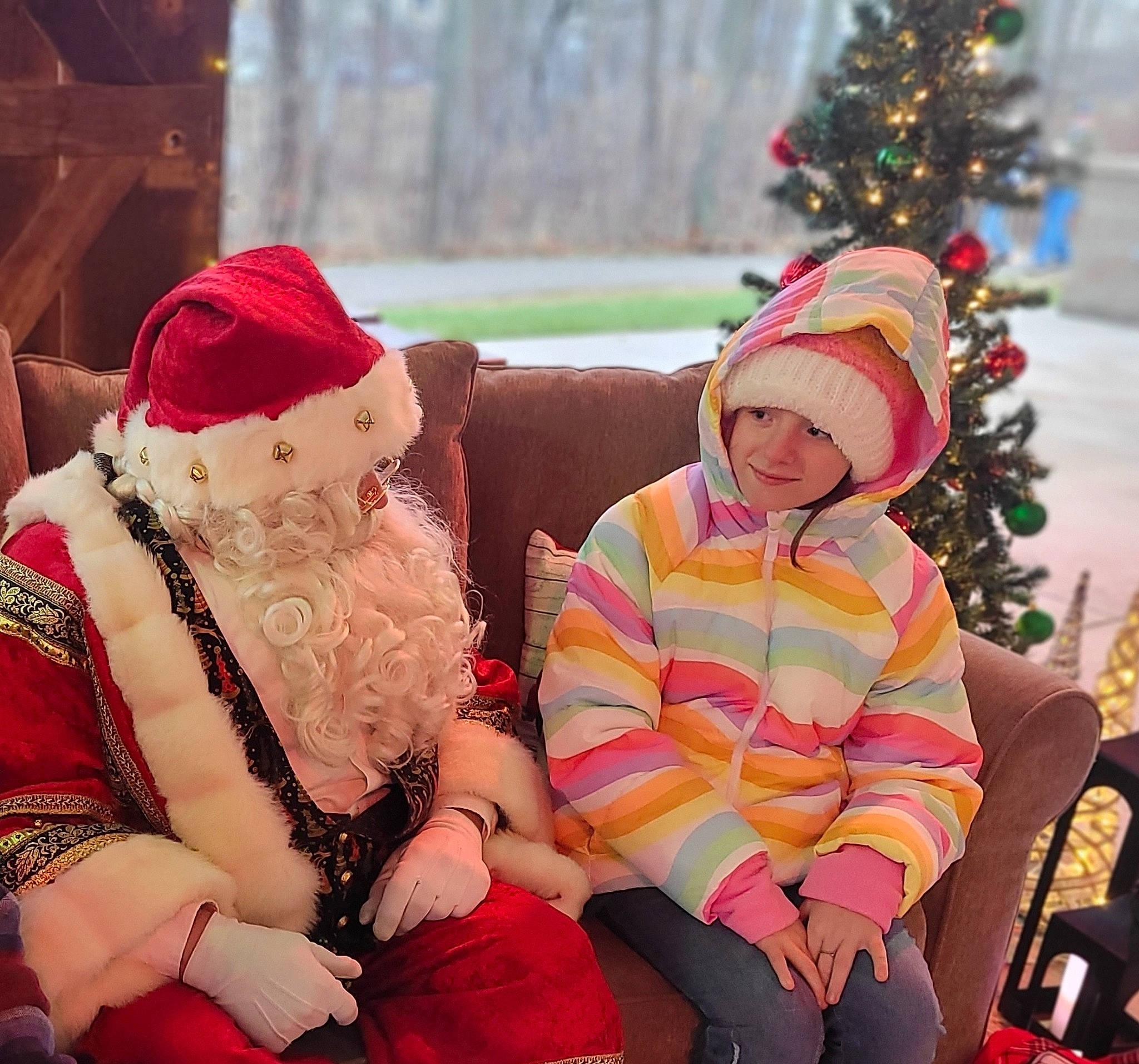 Aubrey joined the competition — help win amazing prizes! christmas, christmas_eve, christmas_tree, comfort, event, fun, happy, headwear, holiday, joy, lap, leisure, magenta, pattern, person, pink, sitting, sleeve, thigh, toddler