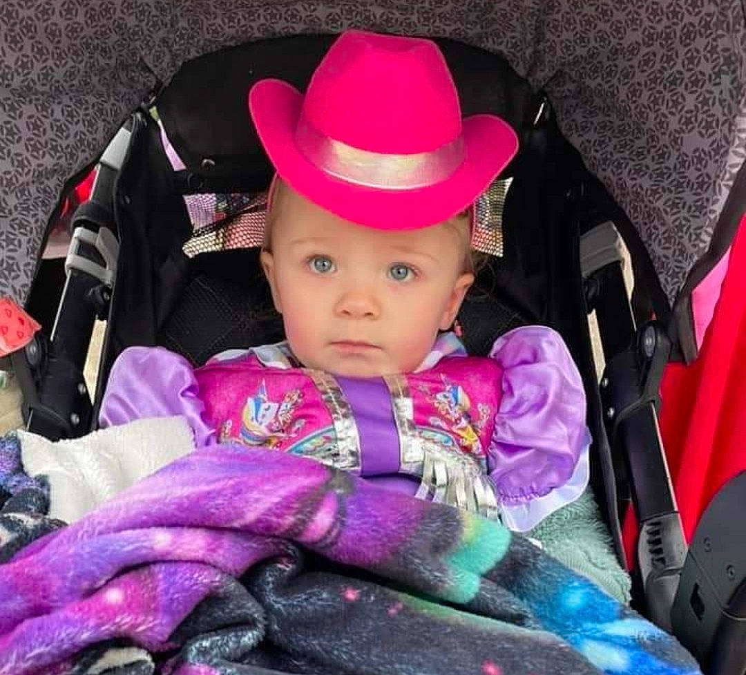 Freyja joined the competition — help win amazing prizes! baby, baby_products, baby_toddler_clothing, cap, carmine, child, comfort, costume_hat, fashion_accessory, hat, head, headwear, human_body, magenta, person, pink, purple, sitting, sleeve, sun_hat