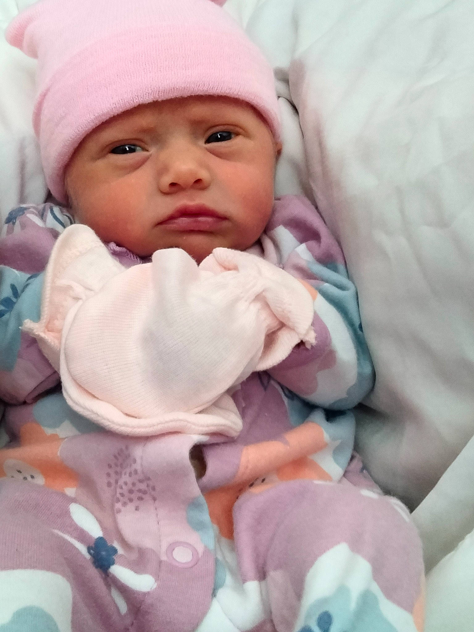 Quinn is registered to the contest to win money with this photo: baby, baby_sleeping, baby_toddler_clothing, cap, cheek, child, comfort, eye, hand, happy, headwear, knit_cap, linens, lip, person, pink, skin, sleeve, textile, thumb