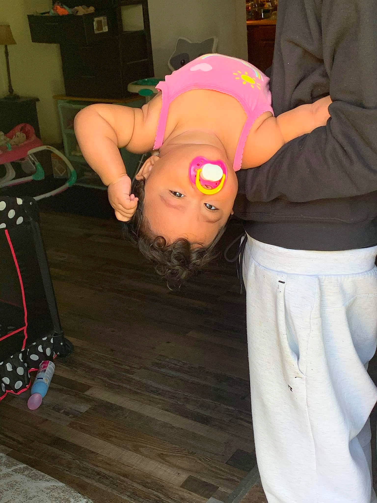 Loyalty is registered to the contest to win money with this photo: abdomen, chest, child, costume, entertainment, event, eyewear, flooring, fun, gesture, headgear, human_leg, joint, magenta, person, pink, shoulder, sportswear, t_shirt, thigh