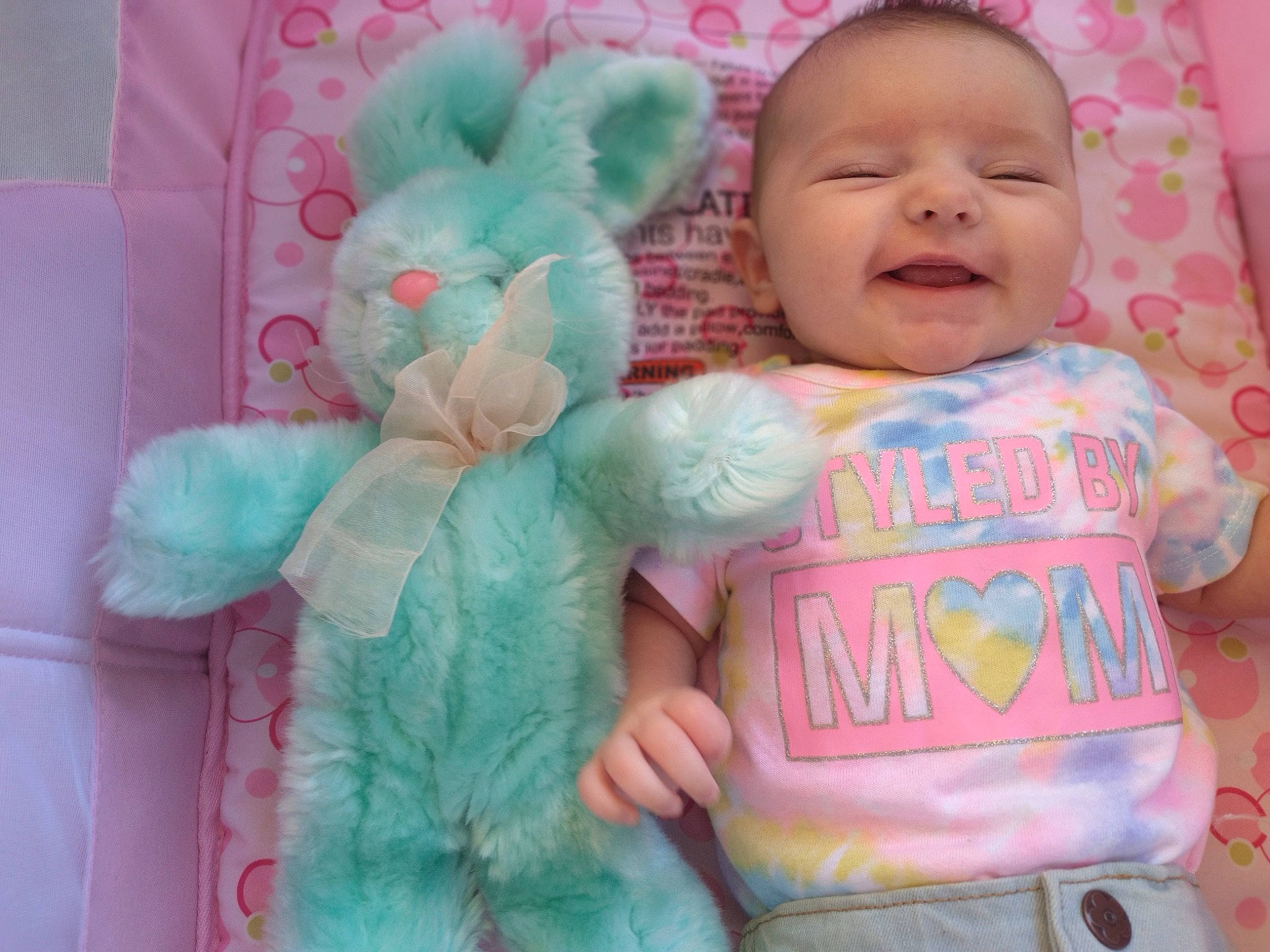 Amara joined the competition — help win amazing prizes! baby, baby_products, baby_toddler_clothing, baby_toys, cheek, child, face, happy, linens, magenta, person, pink, product, skin, sleeve, smile, t_shirt, teddy_bear, textile, toddler