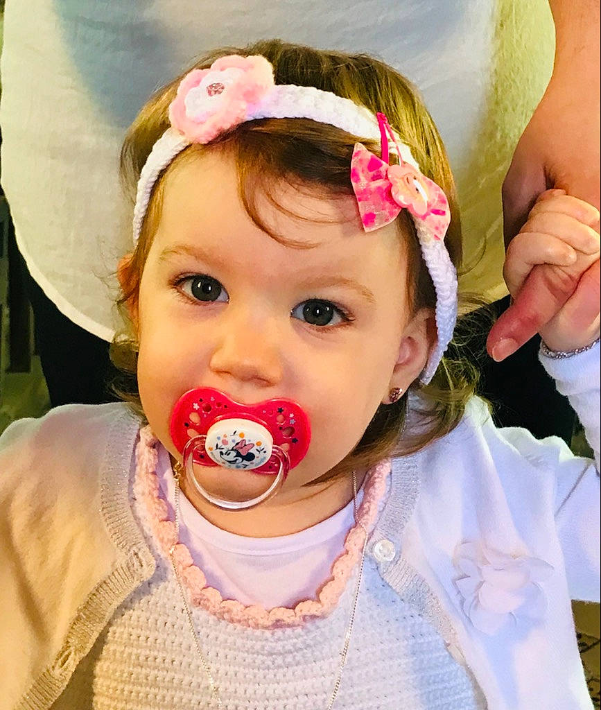 Jelena participe au concours pour gagner de l'argent avec cette photo : baby, baby_toddler_clothing, cheek, chin, dress, ear, eye, eyelash, face, happy, head, headgear, iris, lip, mouth, nose, person, petal, pink, skin