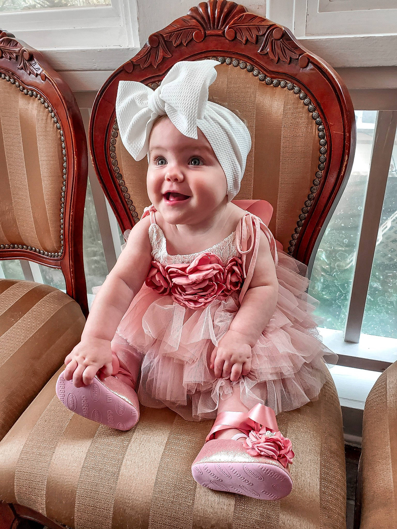 Pearl joined the competition — help win amazing prizes! baby, baby_products, baby_toddler_clothing, chair, child, comfort, fashion_accessory, hair_accessory, happy, headpiece, headwear, joy, magenta, pattern, person, pink, product, sitting, sleeve, smile