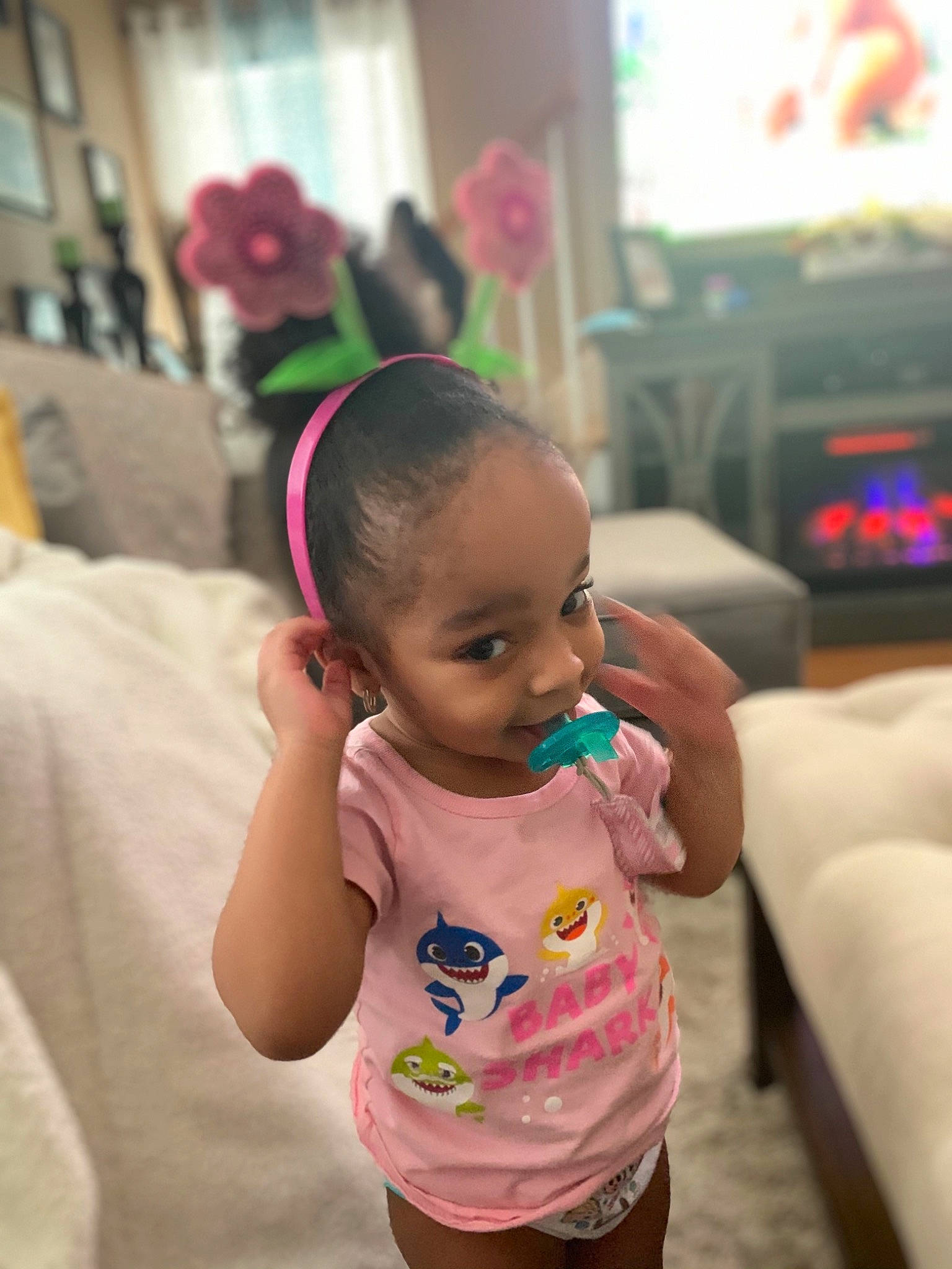 Kehlani joined the competition — help win amazing prizes! baby, baby_toddler_clothing, cheek, child, couch, event, eye, finger, fun, happy, head, iris, leisure, mammal, mouth, person, pink, skin, smile, television
