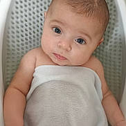 Adalynn joined the competition — help win amazing prizes! baby, towel, bathtub, child, skin, face, eyes, expression, infant, water, bath, cute, person, human, arm, head, closeup, indoor, young, portrait