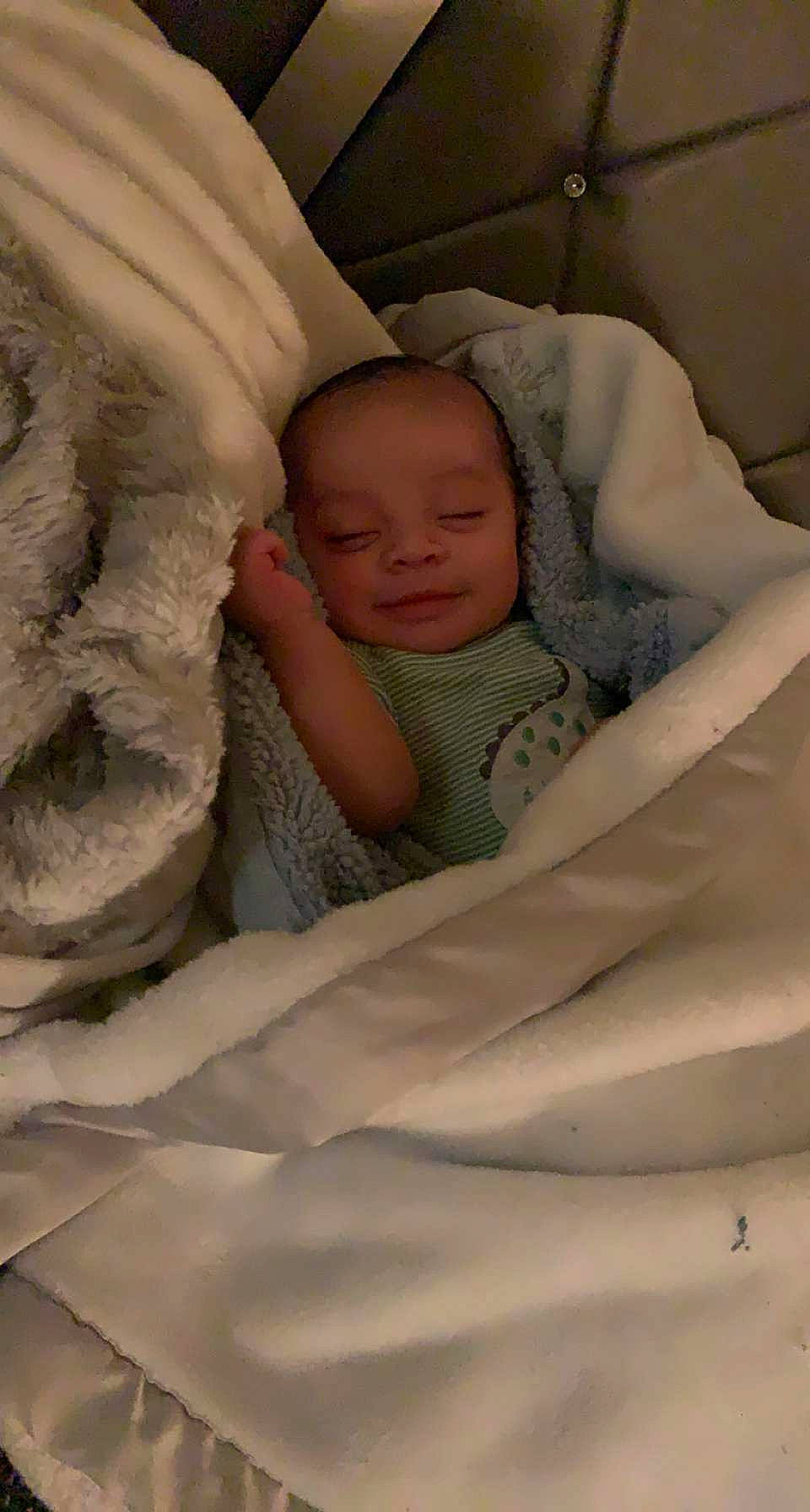 Adriel joined the competition — help win amazing prizes! baby, baby_products, baby_safety, baby_sleeping, bed, bed_sheet, bedding, bedtime, child, comfort, eyebrow, fur, infant_bed, leg, linens, nap, person, room, skin, textile