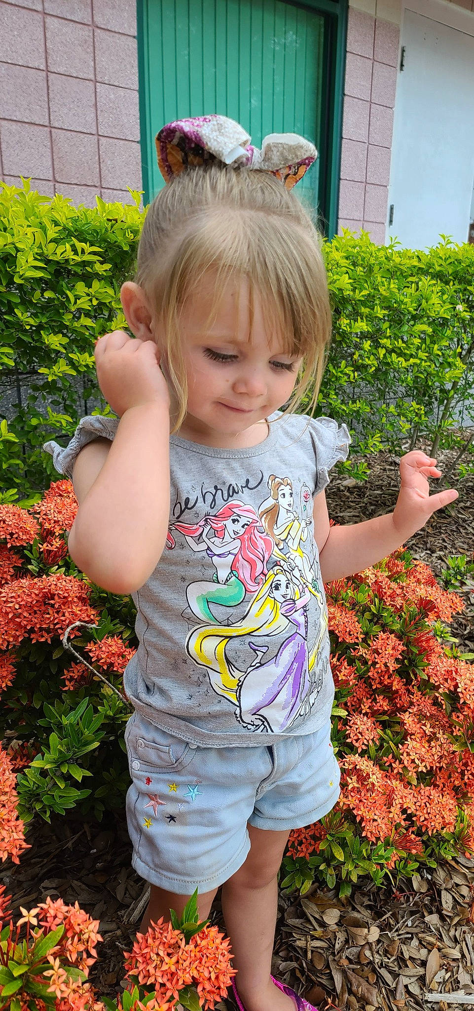 Evah is registered to the contest to win money with this photo: baby_toddler_clothing, beauty, child, flower, fun, grass, green, hair, hairstyle, happy, orange, people, people_in_nature, person, photograph, pink, plant, sleeve, summer, t_shirt