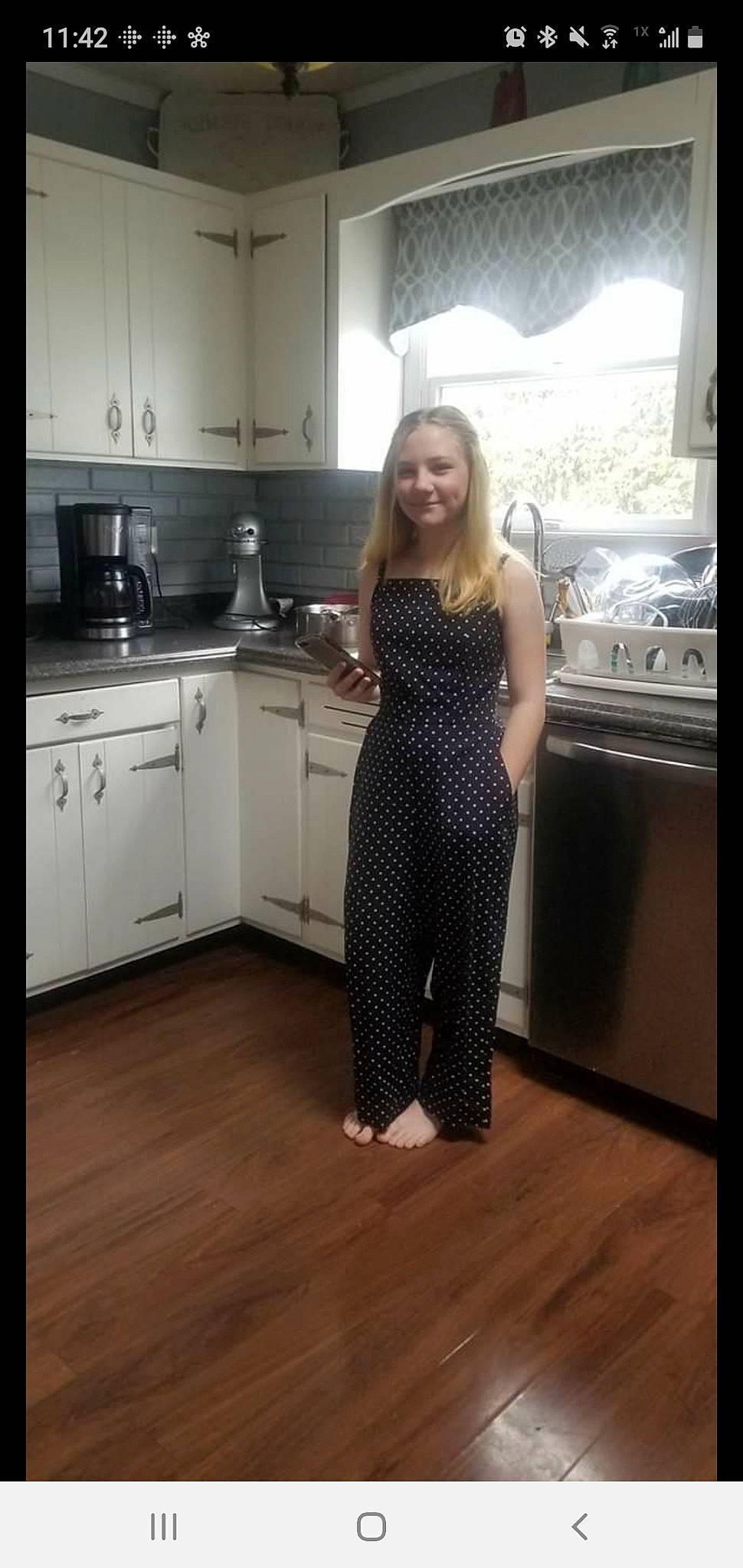 Emma joined the competition — help win amazing prizes! cabinetry, countertop, day_dress, dress, floor, flooring, hardwood, home_appliance, homemaker, joy, kitchen, kitchen_appliance, major_appliance, one_piece_garment, person, sheath_dress, sink, sleeve, smile, stove