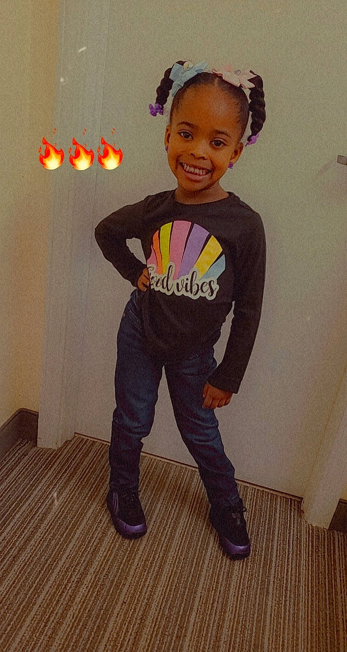 Kilee joined the competition — help win amazing prizes! baby_toddler_clothing, clothing, face, fashion_design, flooring, formal_wear, hair, happy, hardwood, joy, neck, outerwear, person, personal_protective_equipment, sleeve, smile, sportswear, standing, t_shirt, toddler