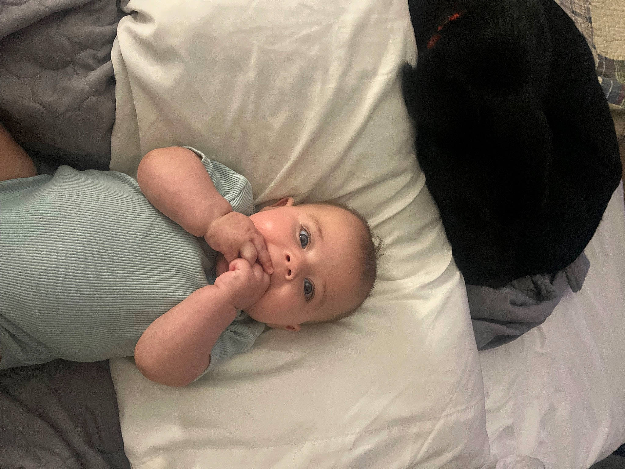 Lakelynn is registered to the contest to win money with this photo: abdomen, baby, baby_products, baby_toddler_clothing, cheek, child, comfort, couch, elbow, event, eye, finger, gesture, hat, human_body, joint, mouth, person, room, skin