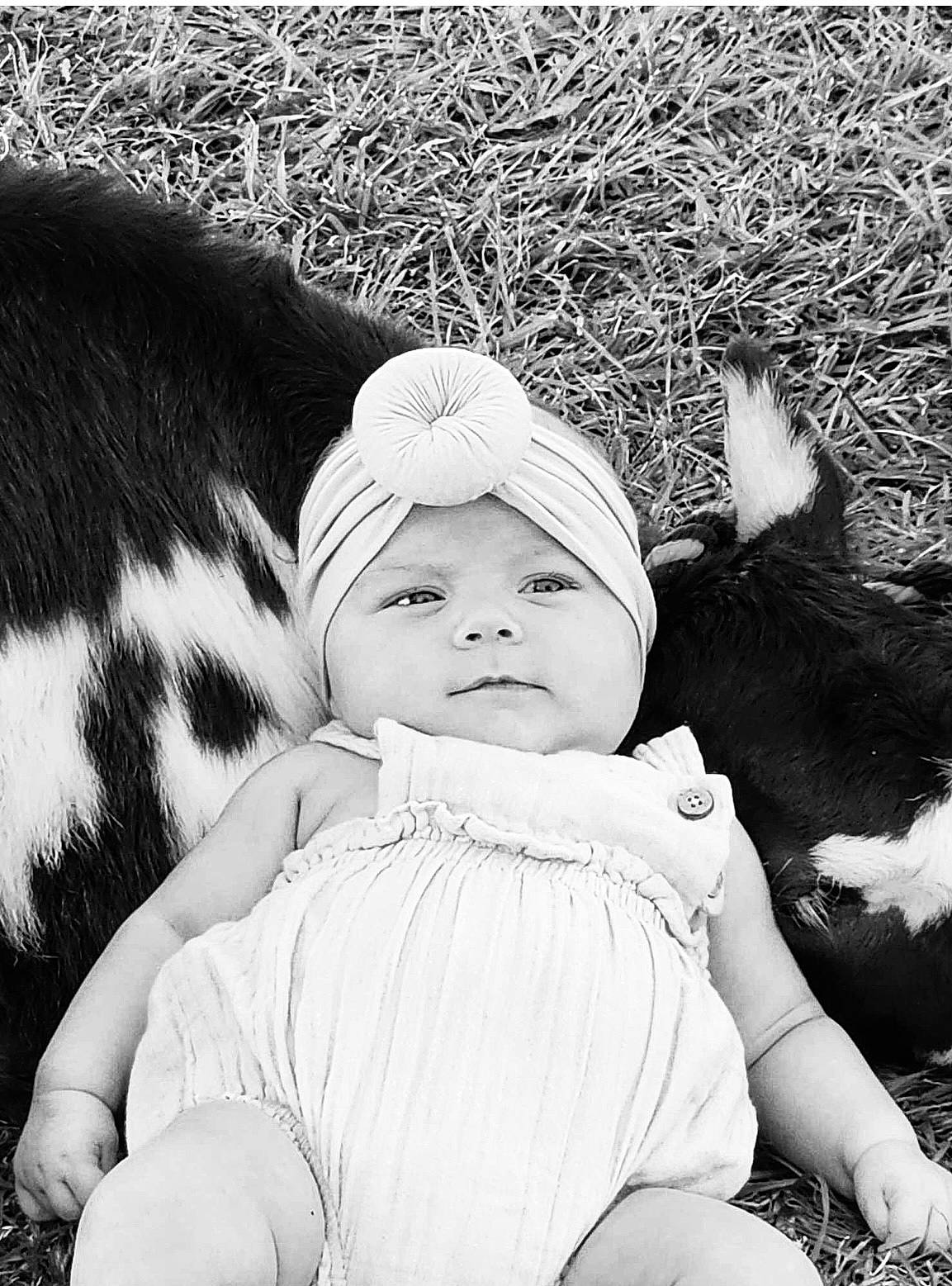 Lakelynn joined the competition — help win amazing prizes! baby, baby_toddler_clothing, black_and_white, cap, cheek, child, fur, gesture, grass, happy, headgear, headwear, monochrome, monochrome_photography, pattern, people_in_nature, person, portrait_photography, sitting, stock_photography