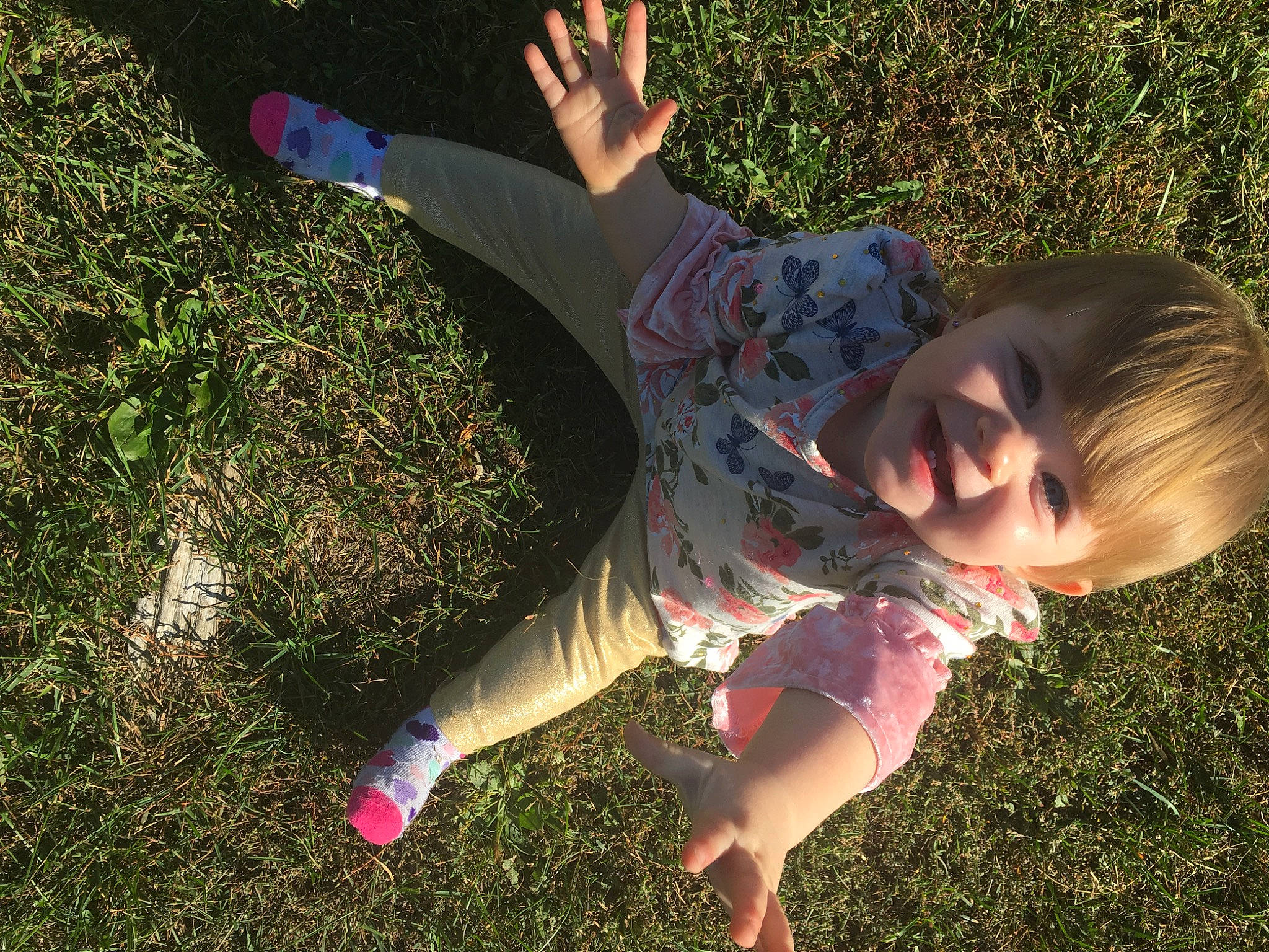 Mckenna is registered to the contest to win money with this photo: child, fun, grass, happy, person, plant, play