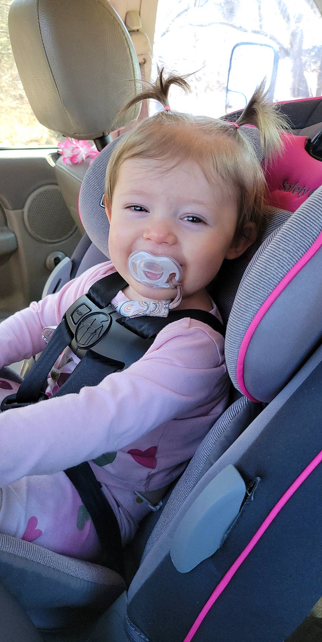 Scarlett is registered to the contest to win money with this photo: auto_part, automotive_design, baby, baby_carriage, baby_in_car_seat, car, car_seat, car_seat_cover, comfort, face, finger, head_restraint, motor_vehicle, person, pink, seat_belt, steering_part, steering_wheel, toddler, vehicle_door