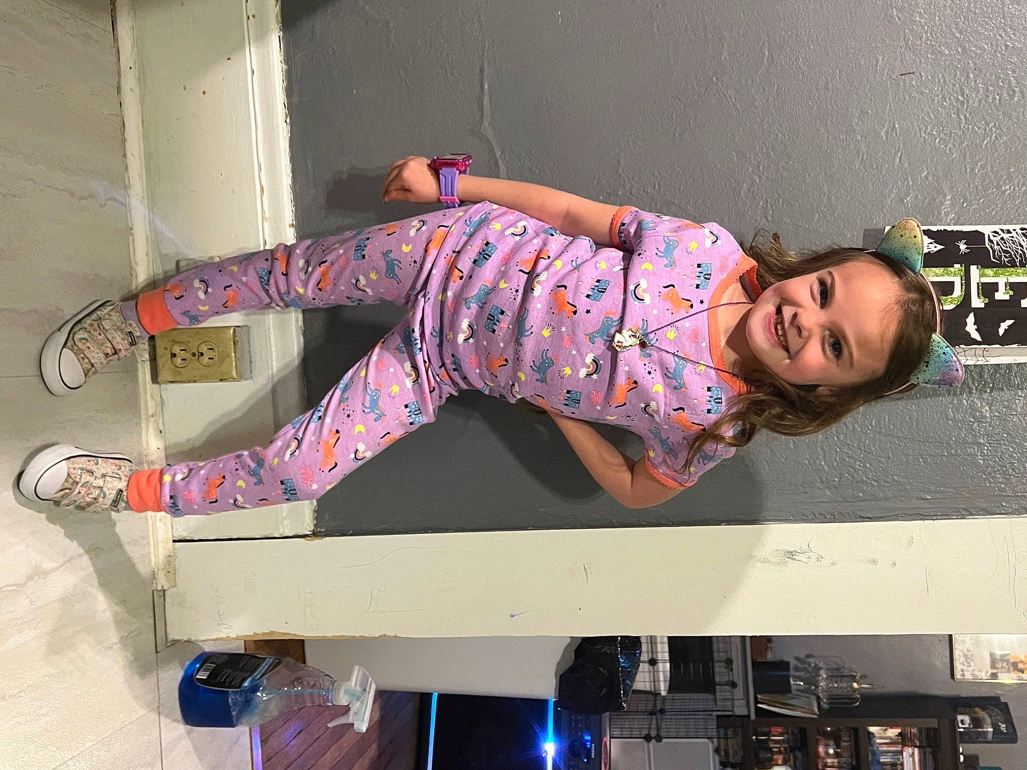 Grace is registered to the contest to win money with this photo: beauty, child, fashion_design, flash_photography, fun, human_leg, joy, knee, leisure, magenta, pattern, person, pink, purple, shoe, sitting, sleeve, t_shirt, textile, thigh