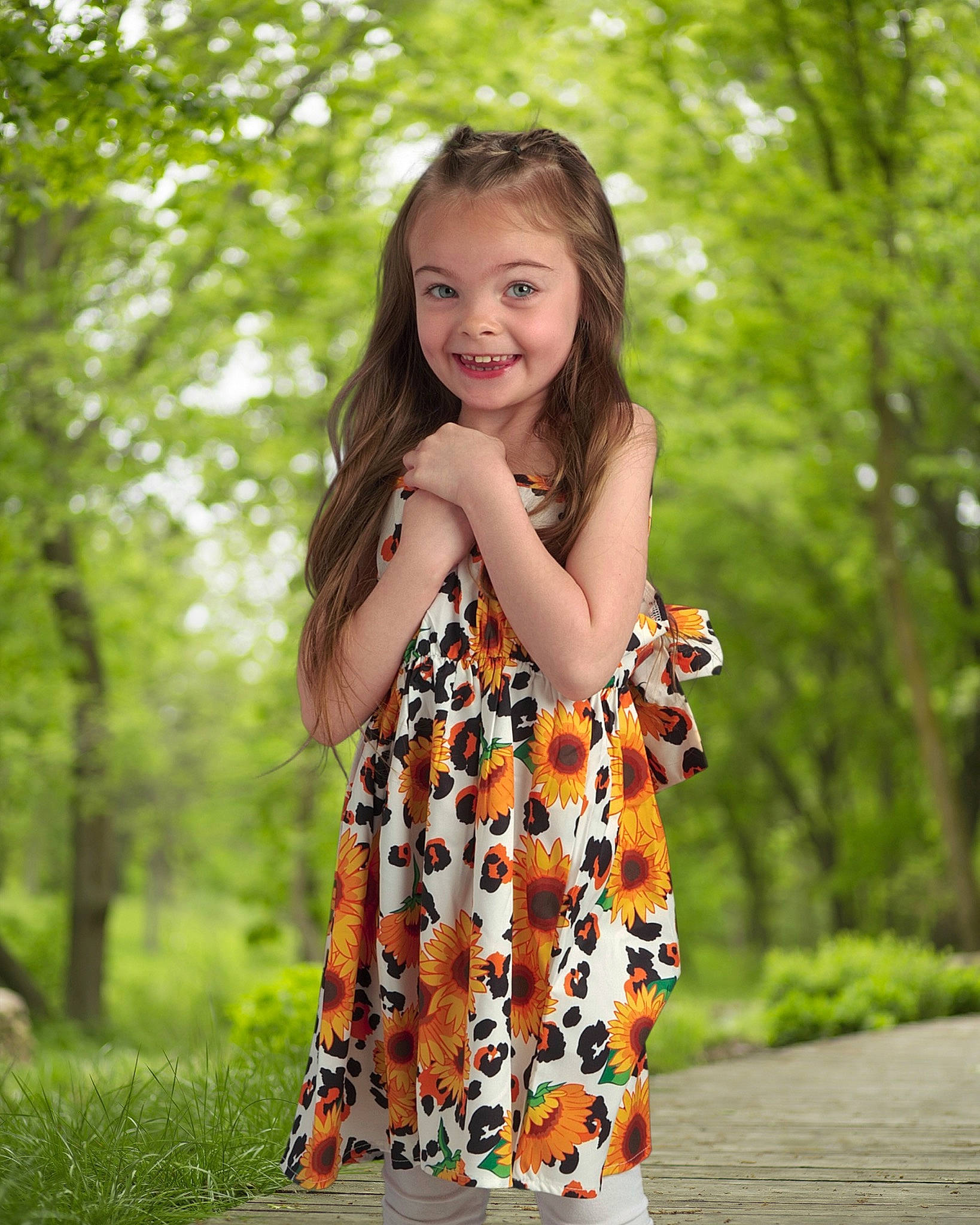 Grace is registered to the contest to win money with this photo: blond, brown_hair, child, clothing, day_dress, dress, electric_blue, grass, hairstyle, happy, jewellery, joy, long_hair, pattern, people_in_nature, person, plant, sleeve, smile, t_shirt