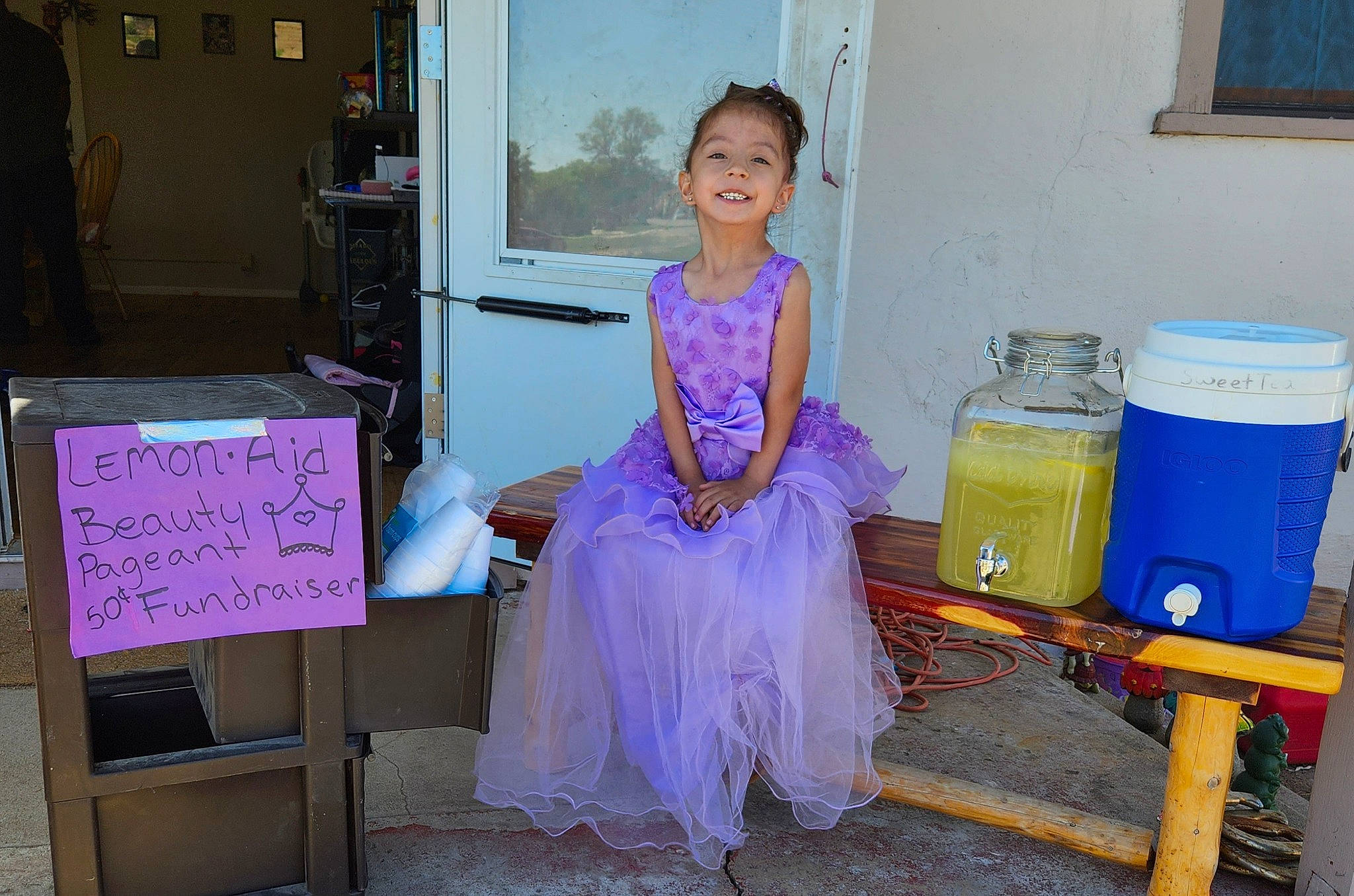 Ayanna joined the competition — help win amazing prizes! blue, costume, dress, electric_blue, event, fashion_design, formal_wear, fun, fur, gown, handwriting, happy, household_supply, joy, magenta, person, pink, purple, room, sitting