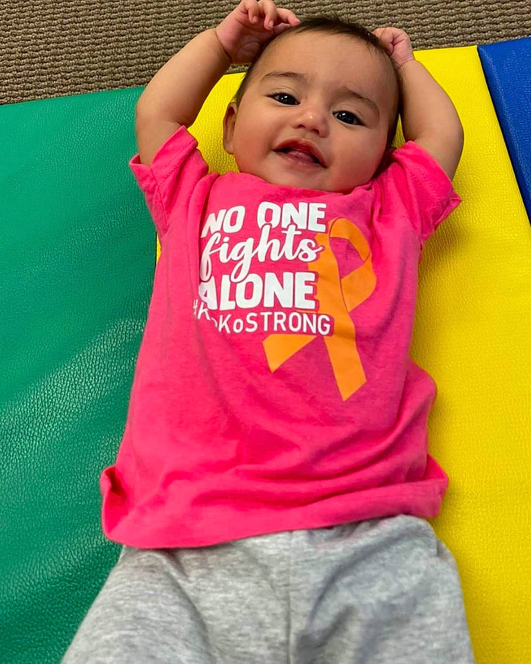 Gianna joined the competition — help win amazing prizes! baby, baby_toddler_clothing, child, fun, outerwear, person, pink, play, sleeve, smile, t_shirt, textile, toddler, yellow