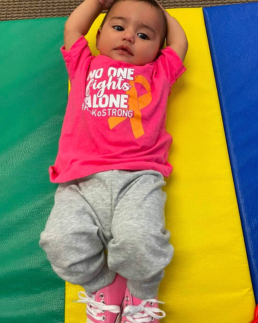 Gianna is registered to the contest to win money with this photo: child, fun, person, pink, play, smile, toddler, yellow