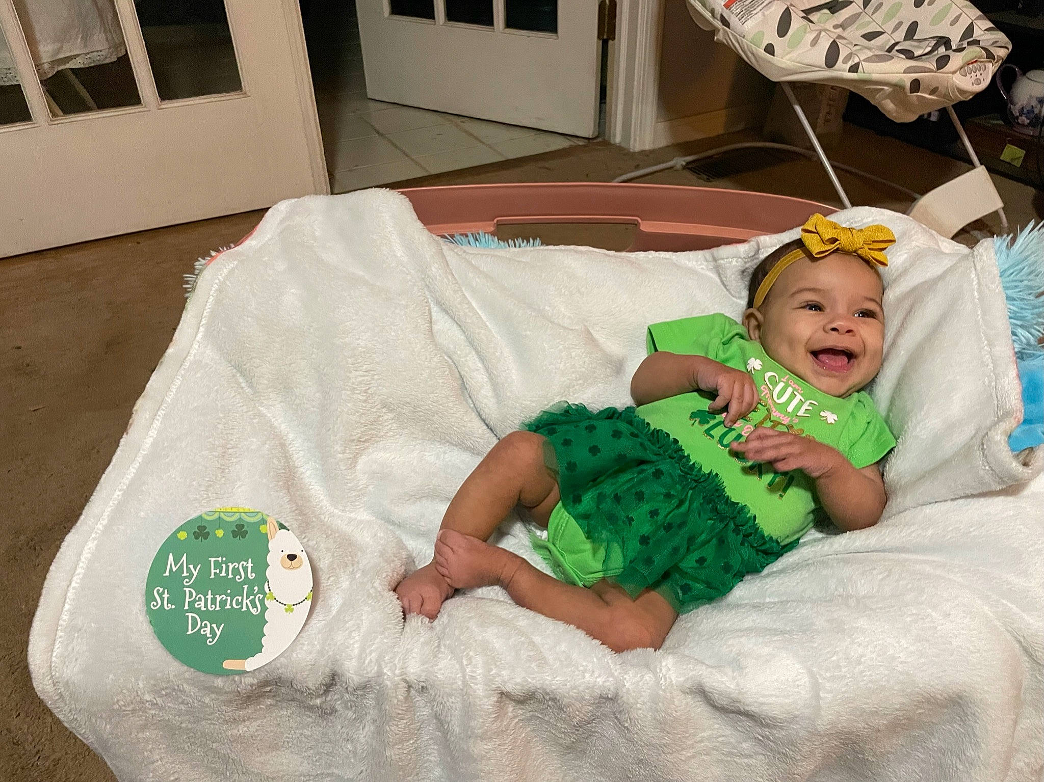 Ryder is registered to the contest to win money with this photo: baby, baby_toddler_clothing, bedding, child, comfort, event, fun, grass, happy, holiday, lap, linens, pattern, person, room, sitting, smile, t_shirt, throw_pillow, toddler