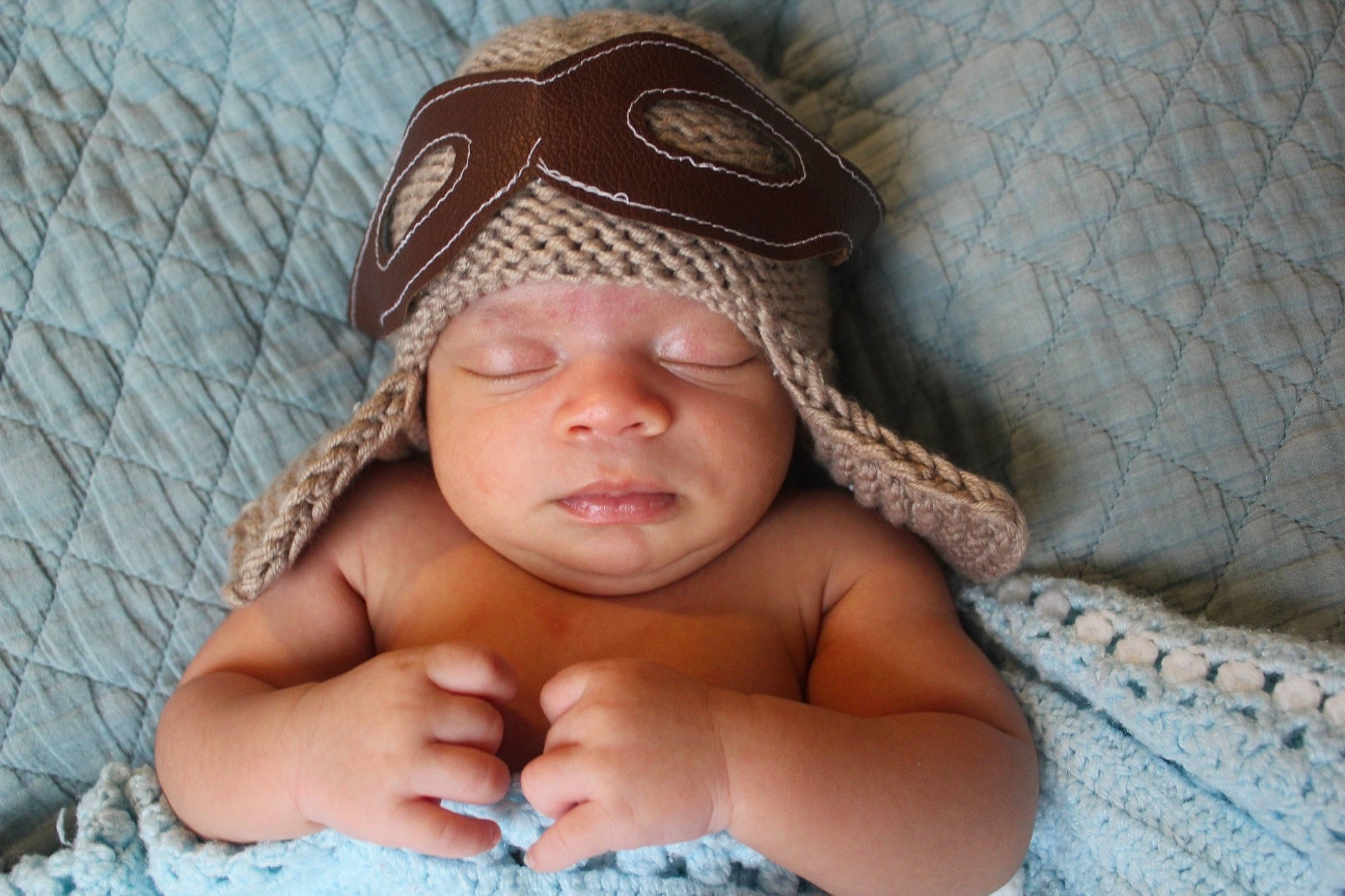 Konnor is registered to the contest to win money with this photo: baby, baby_sleeping, beanie, bonnet, cap, child, crochet, fashion_accessory, hat, headgear, headwear, knit_cap, pattern, person, skin, toddler