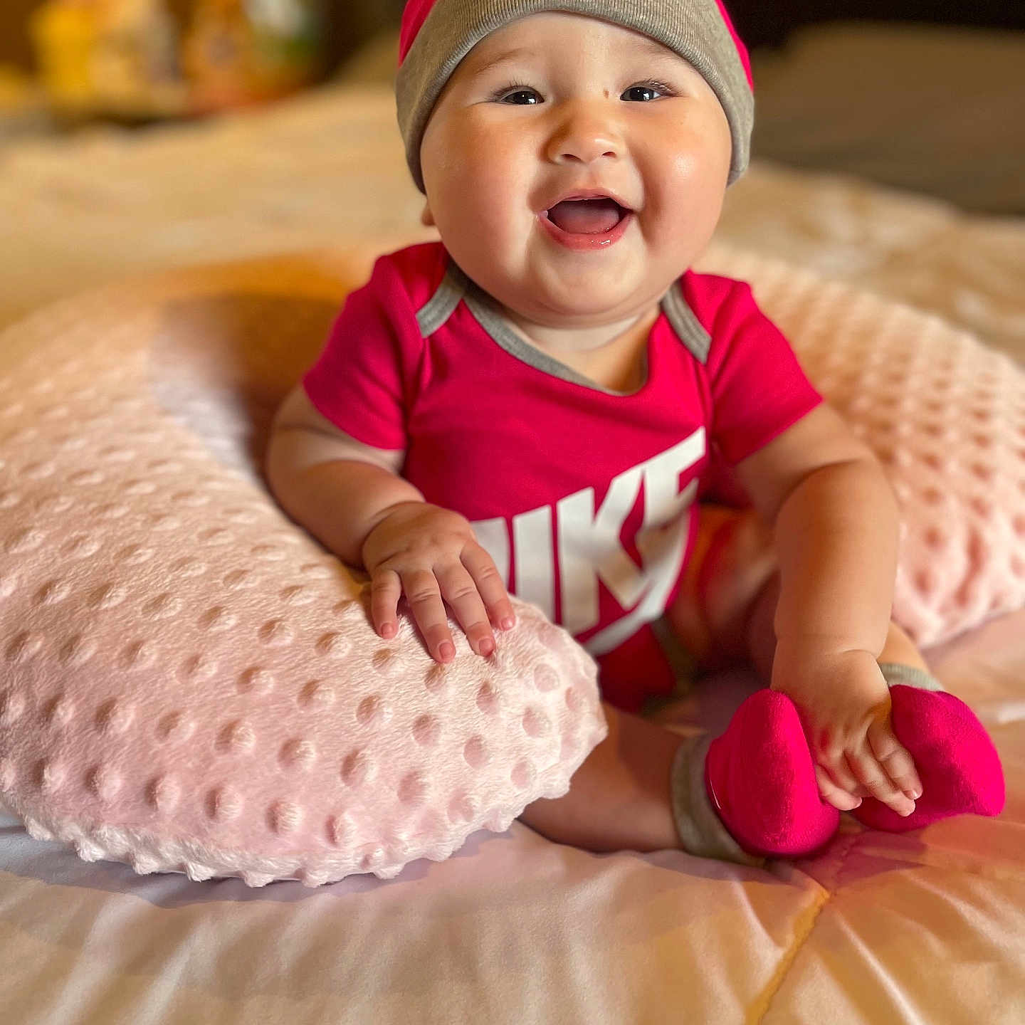 Camila joined the competition — help win amazing prizes! baby, babylaughing, bodypart, cap, clothing, couch, cushion, face, finger, furniture, hand, happy, hat, head, homedecor, laughing, person, photography, portrait, smile