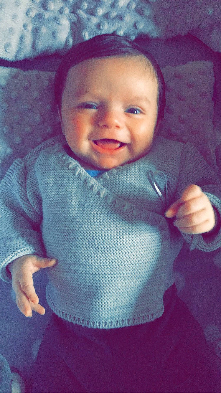 Kenny participe au concours pour gagner de l'argent avec cette photo : arm, azure, baby_toddler_clothing, cheek, chin, eye, eyebrow, head, lip, mouth, neck, nose, organ, outerwear, person, purple, skin, sleeve, smile, standing