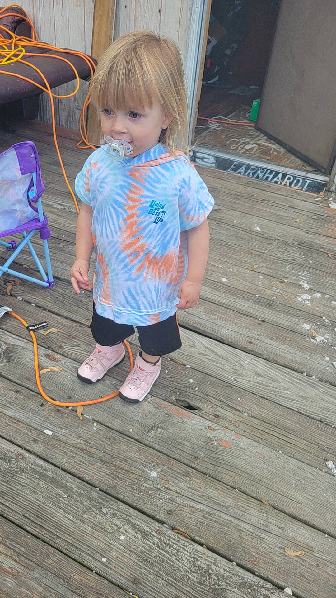 Charlotte joined the competition — help win amazing prizes! baby_toddler_clothing, barefoot, chair, child, flooring, foot, fun, hairstyle, hardwood, human_leg, leg, leisure, magenta, pattern, person, play, sandal, t_shirt, toddler, vacation