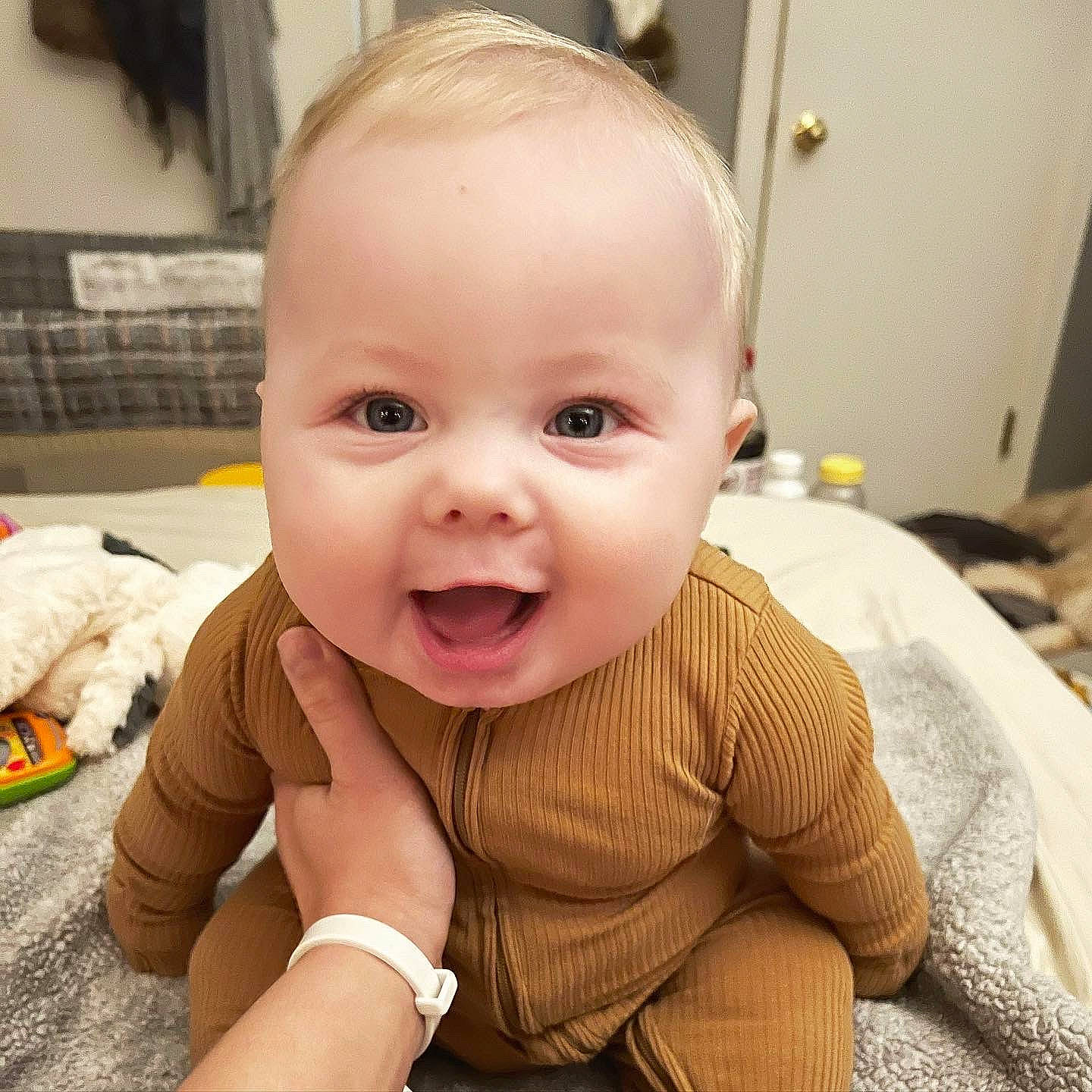 Oliver is registered to the contest to win money with this photo: baby, baby_toddler_clothing, cheek, chin, crawling, ear, eye, face, finger, gesture, happy, head, iris, lip, mouth, nose, person, skin, smile, toddler