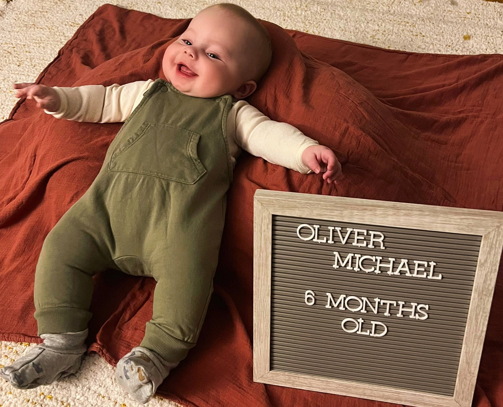 Oliver joined the competition — help win amazing prizes! baby, baby_sleeping, baby_toddler_clothing, bedding, child, comfort, font, happy, linens, pattern, person, photo_caption, product, room, sitting, sleeve, smile, t_shirt, textile, toddler