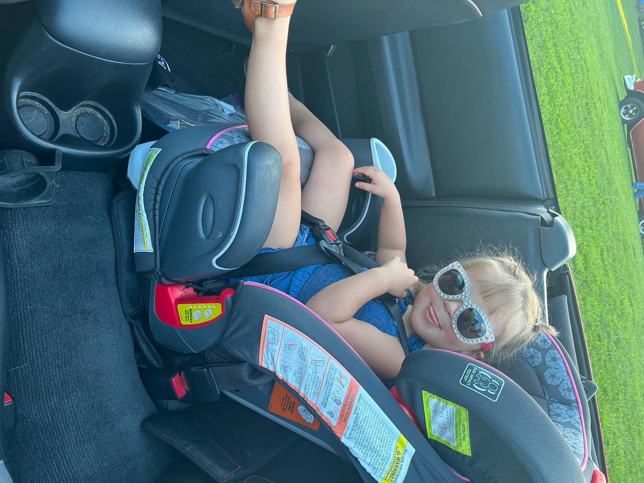 Emalee joined the competition — help win amazing prizes! auto_part, automotive_design, automotive_exterior, car, car_seat, car_seat_cover, comfort, electric_blue, eyewear, family_car, goggles, head_restraint, luxury_vehicle, mode_of_transport, motor_vehicle, person, personal_luxury_car, steering_wheel, sunglasses, vehicle