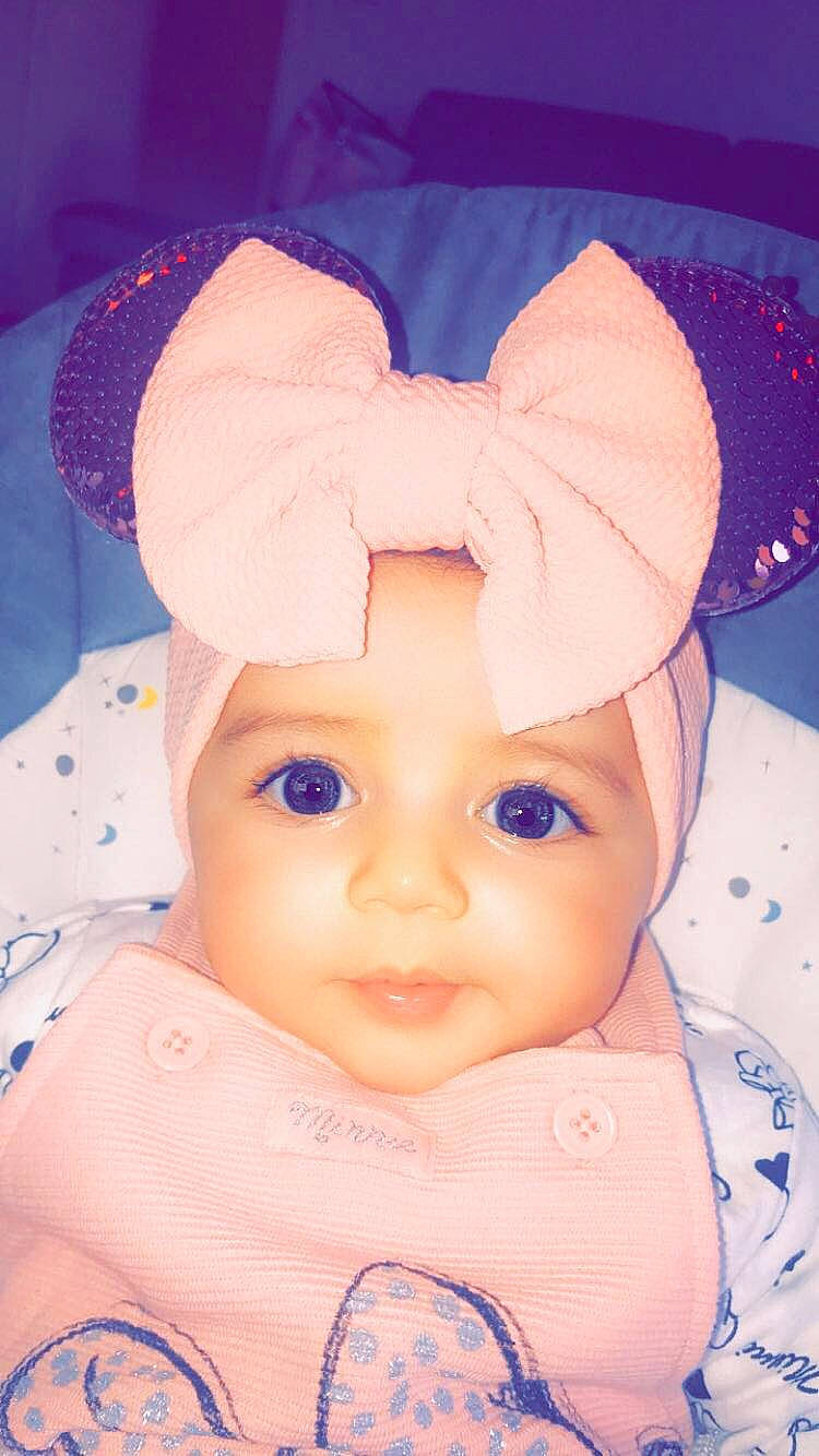 Julianna a rejoint le concours — aidez-le/la à gagner de superbes lots ! baby, cheek, child, ear, eye, eyebrow, eyelash, face, forehead, head, headgear, headwear, iris, lip, nose, person, pink, skin, toddler