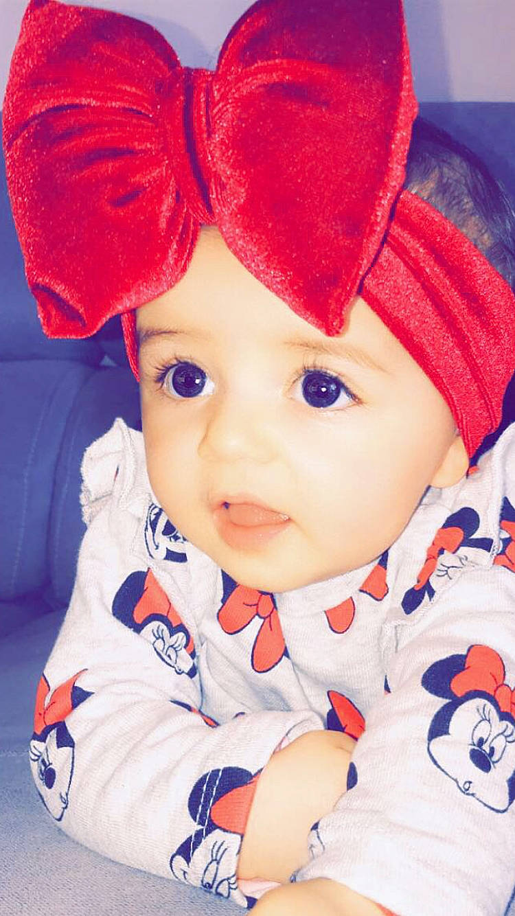 Julianna participe au concours pour gagner de l'argent avec cette photo : baby, cheek, child, headgear, headwear, lip, person, red, toddler