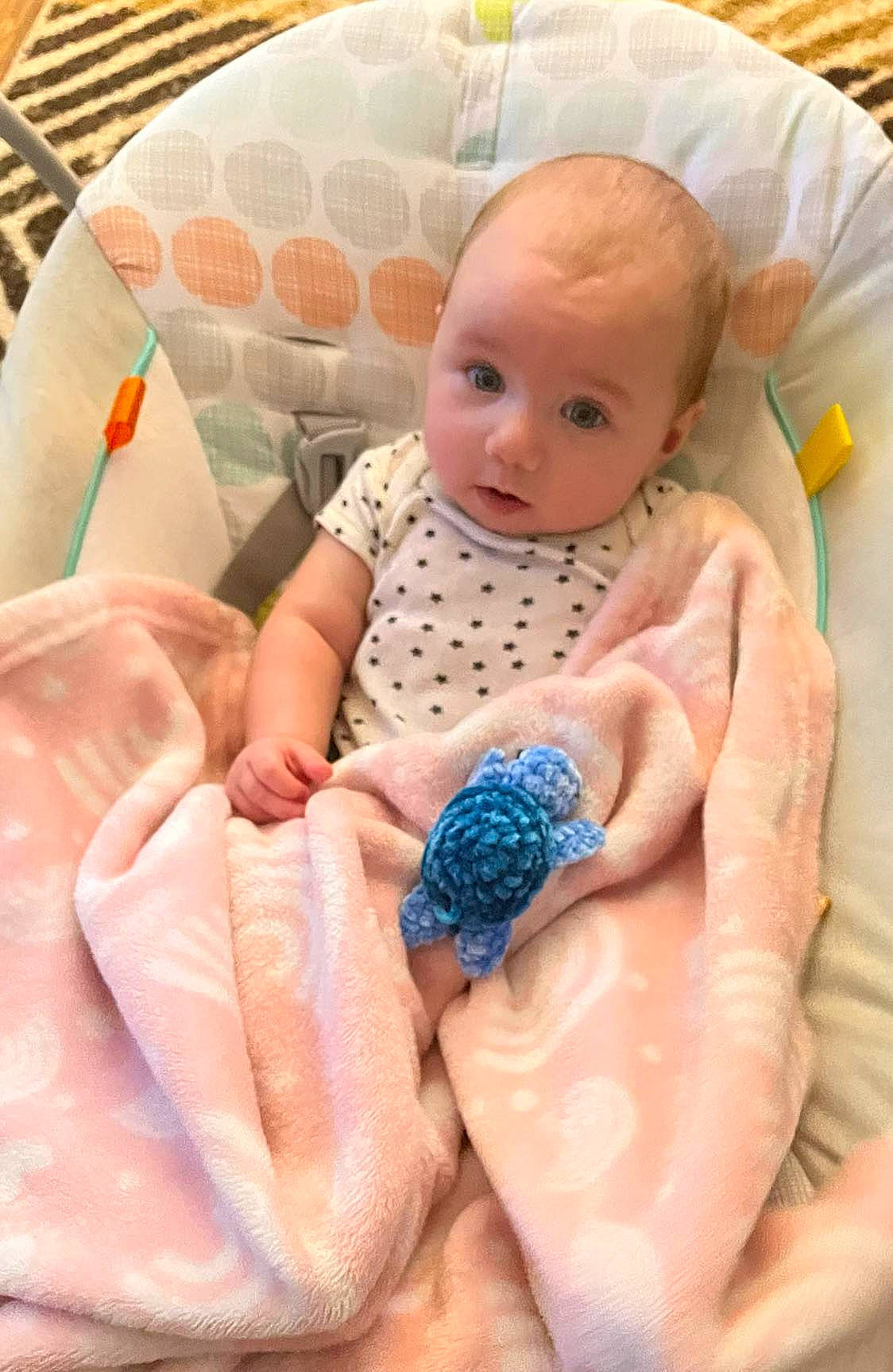 Esme is registered to the contest to win money with this photo: baby, baby_products, baby_sleeping, baby_toddler_clothing, bedding, child, comfort, doll, electric_blue, finger, linens, nail, peach, person, pink, product, skin, textile, thumb, toddler