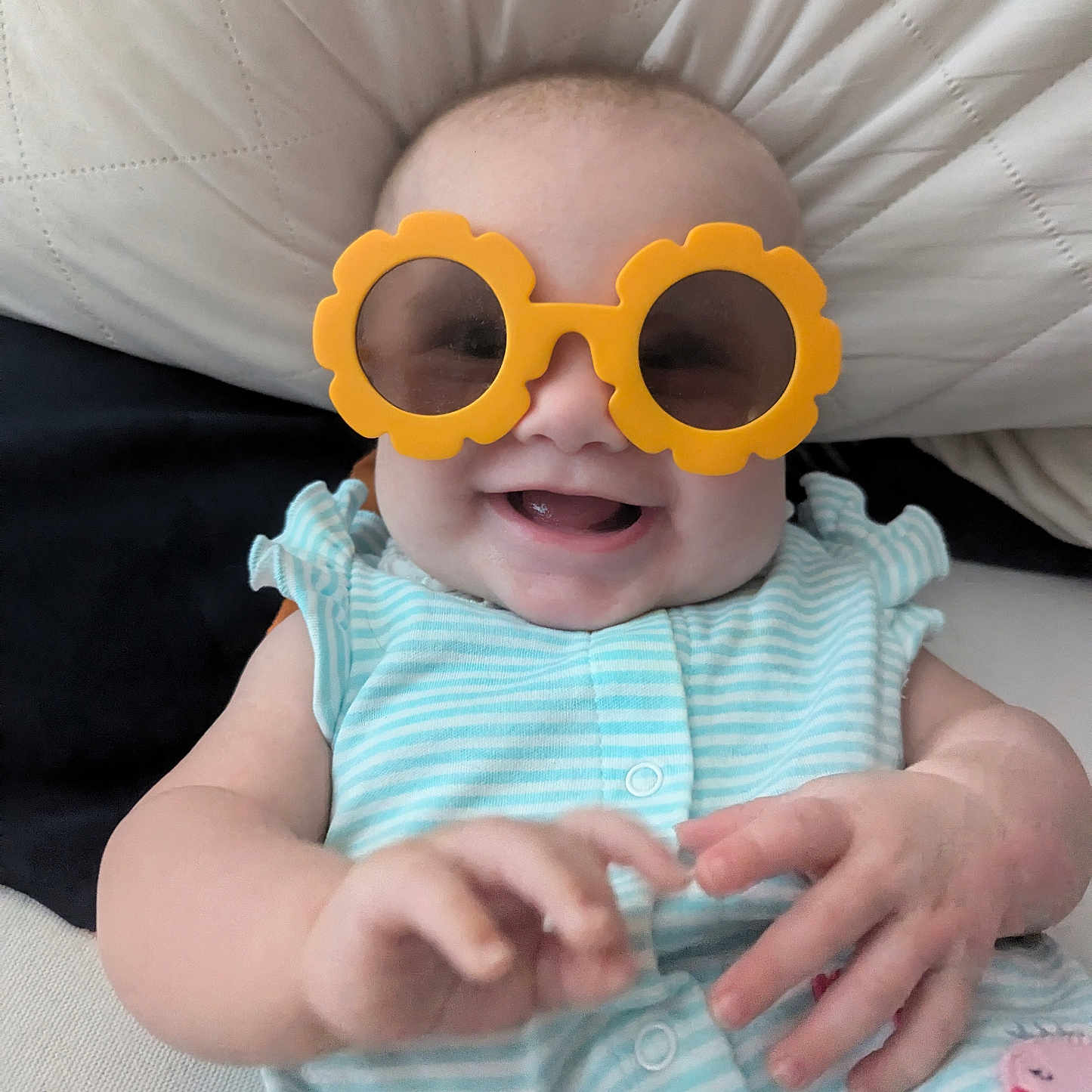 Delilah joined the competition — help win amazing prizes! accessories, baby, babylaughing, bodypart, couch, cushion, face, finger, glasses, hand, happy, head, homedecor, laughing, newborn, person, photography, portrait, smile, sunglasses