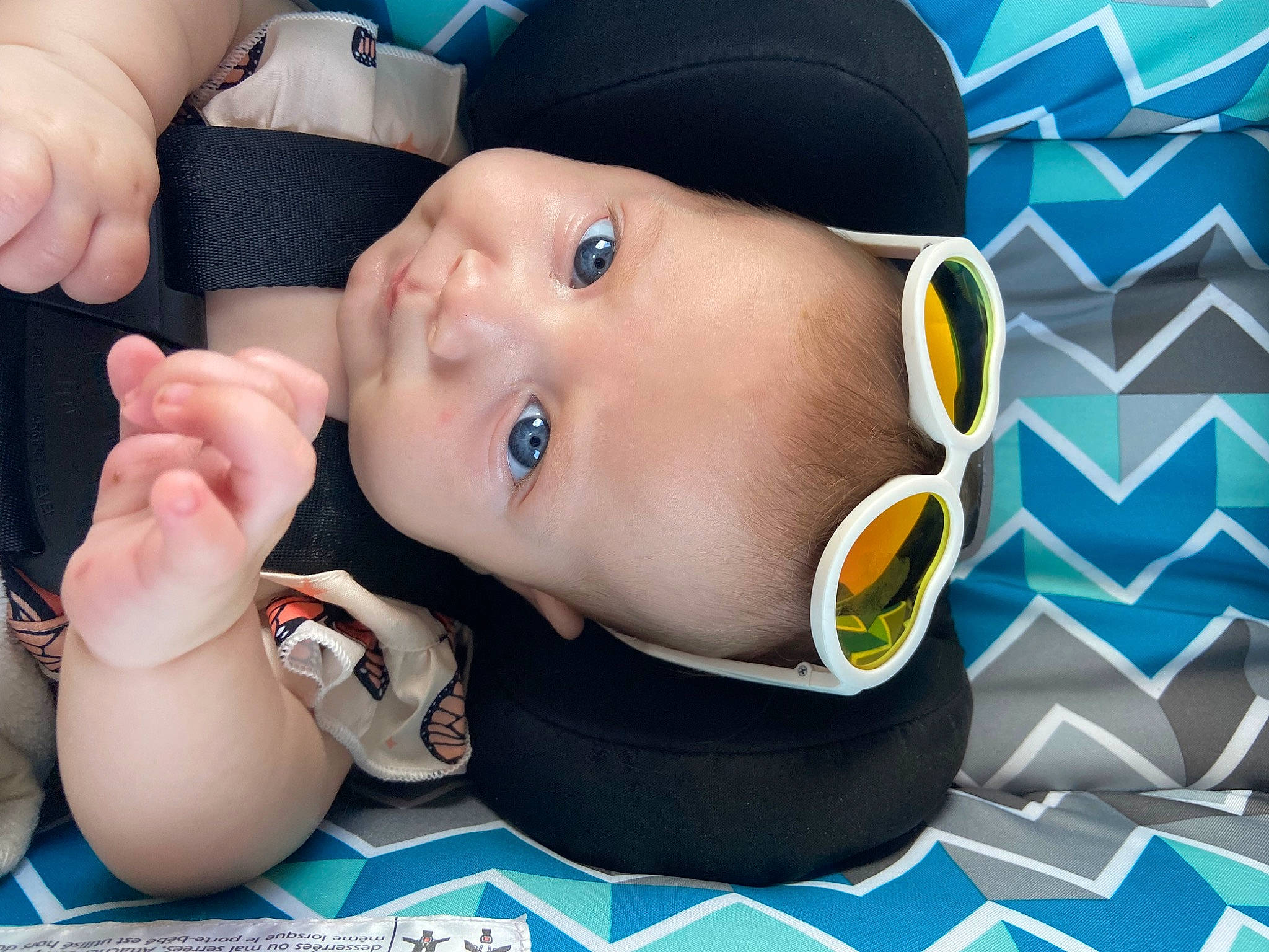 Winter joined the competition — help win amazing prizes! baby, baby_toddler_clothing, blue, cap, cheek, chin, drinkware, eyebrow, eyelash, finger, gesture, hat, headgear, iris, lip, mouth, nose, person, skin, sun_hat