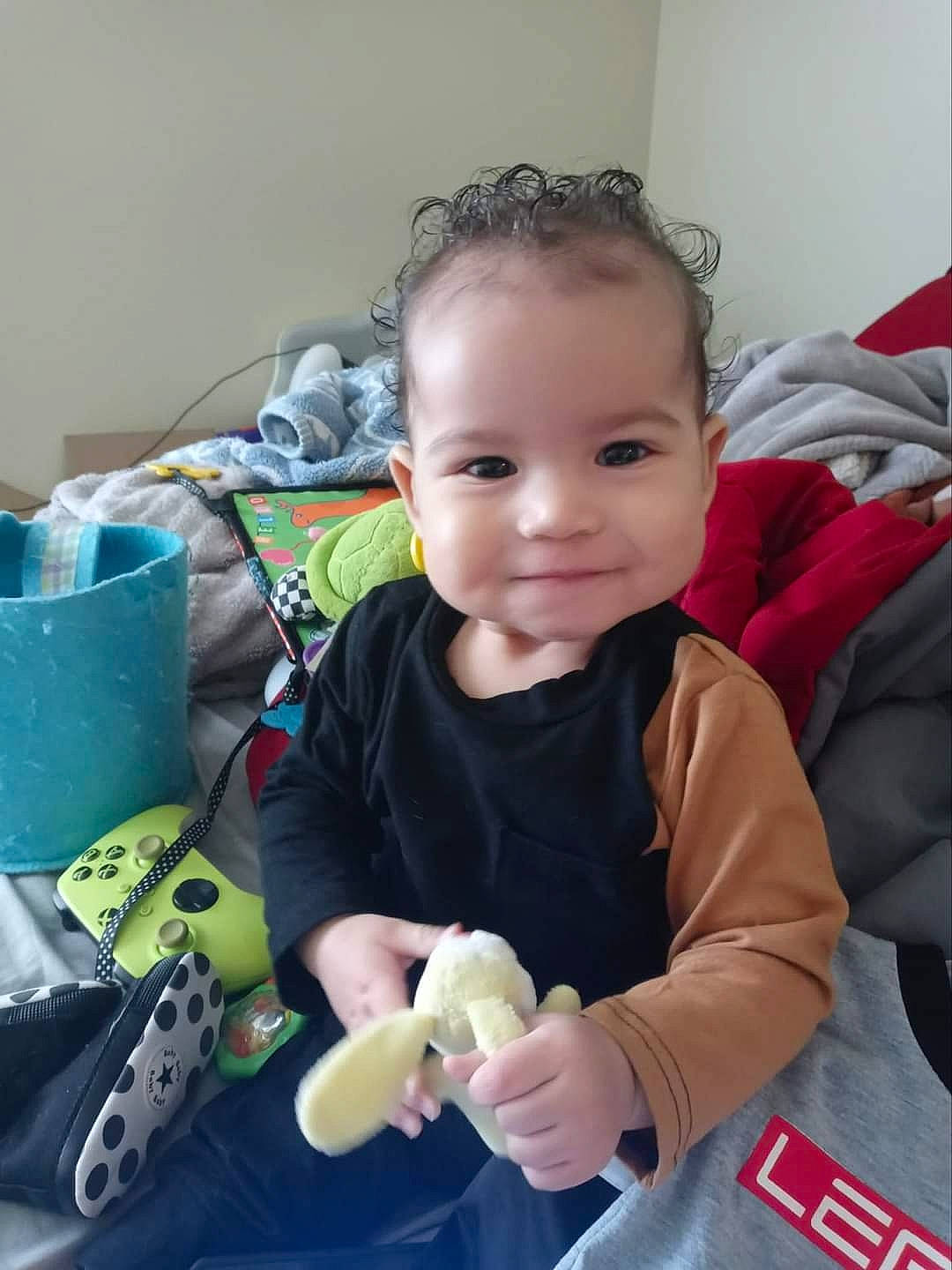 Dior joined the competition — help win amazing prizes! baby, baby_products, baby_toddler_clothing, cheek, child, fun, happy, joy, person, personal_protective_equipment, room, sitting, sleeve, smile, thumb, toddler