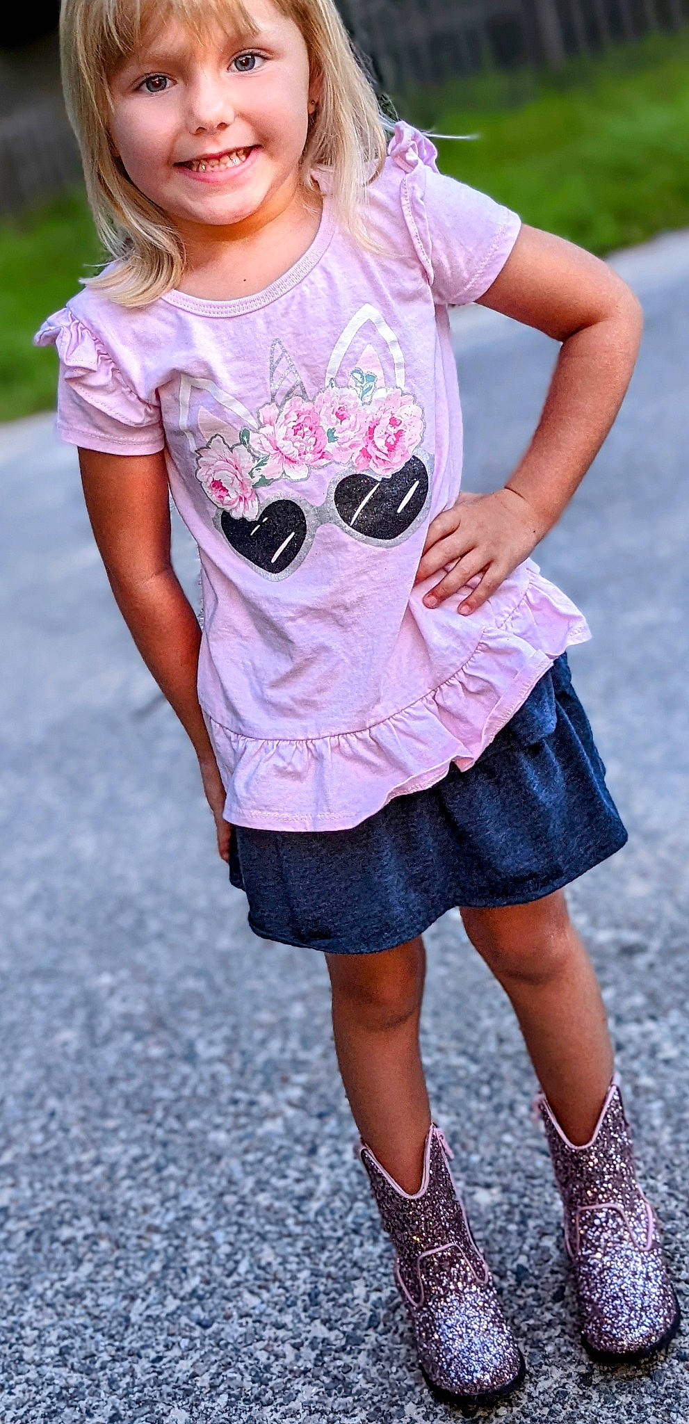 Ambrielle is registered to the contest to win money with this photo: baby_toddler_clothing, day_dress, electric_blue, fashion, human_leg, joy, knee, magenta, neck, pattern, person, pink, purple, shoulder, sleeve, standing, t_shirt, tartan, textile, thigh